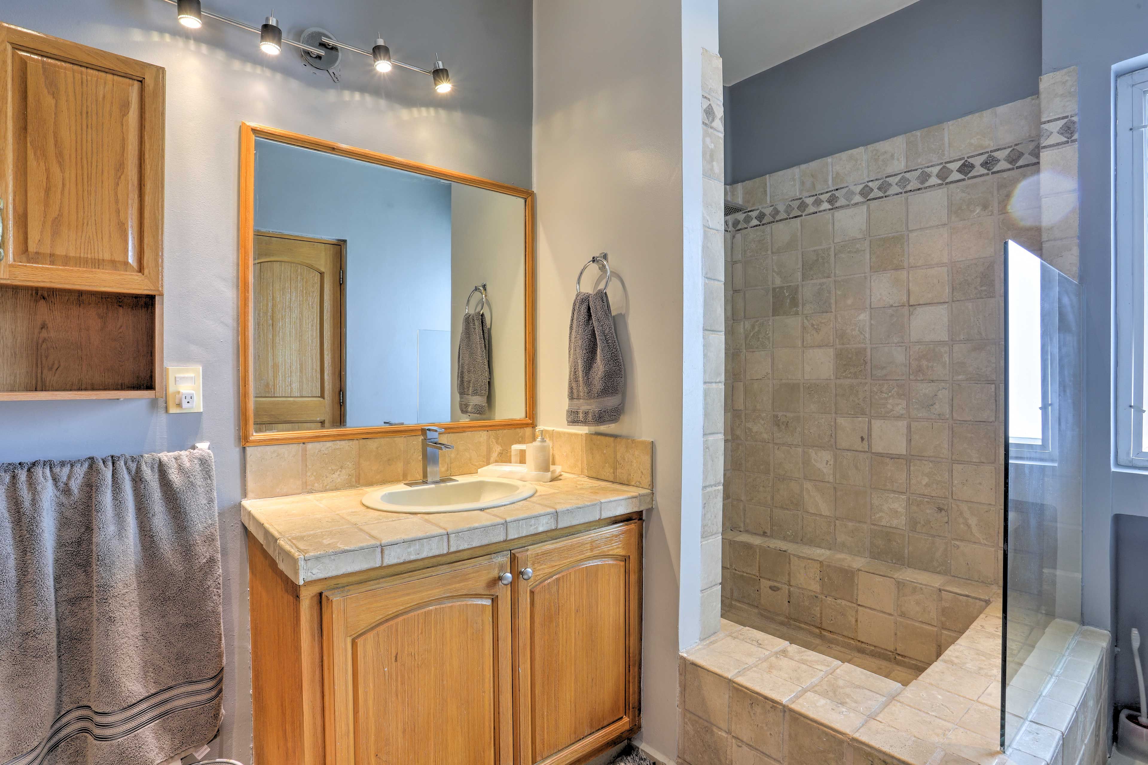 Rinse off before bed in the en-suite bathroom.