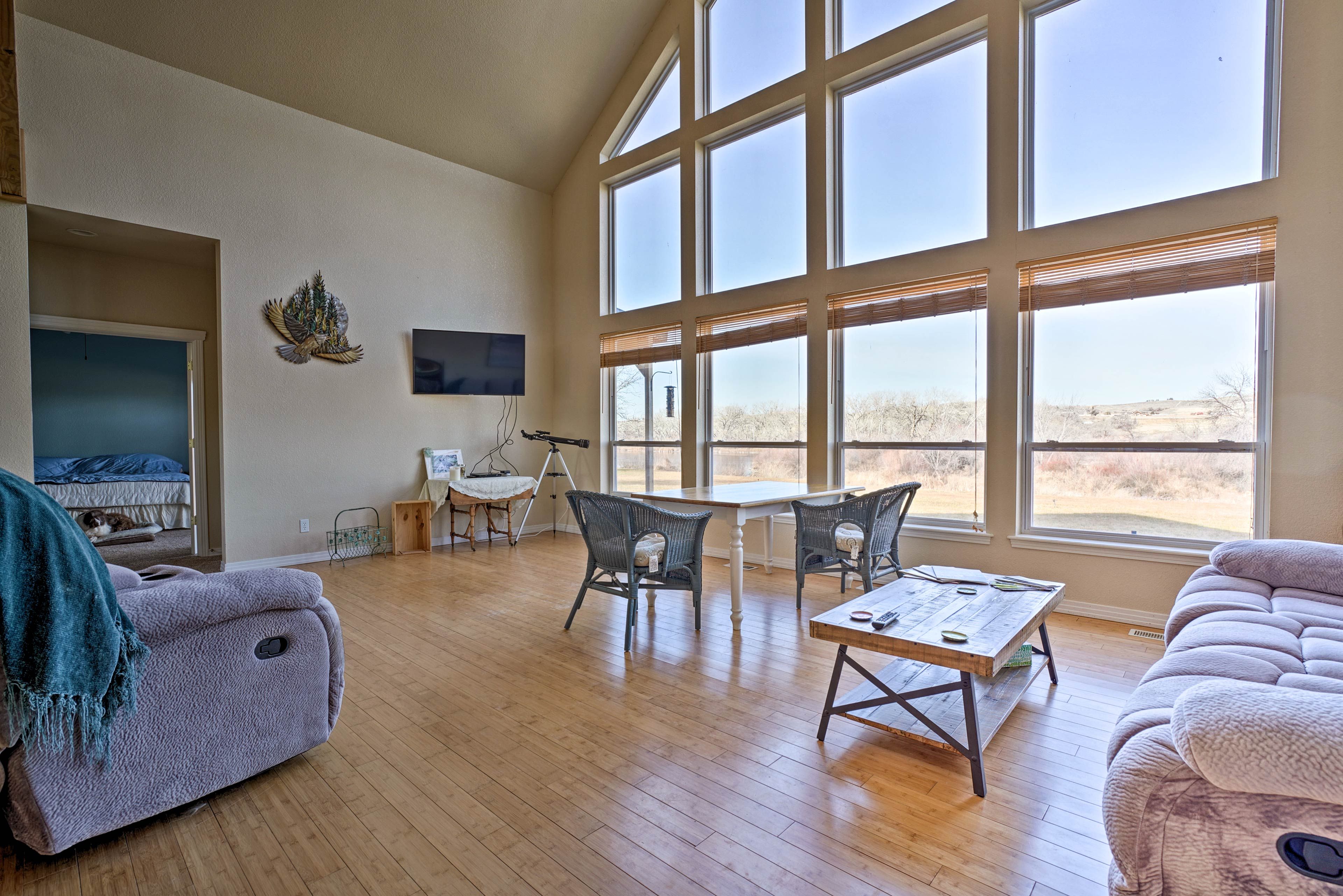 Watch a movie on the flat-screen TV in the living room.