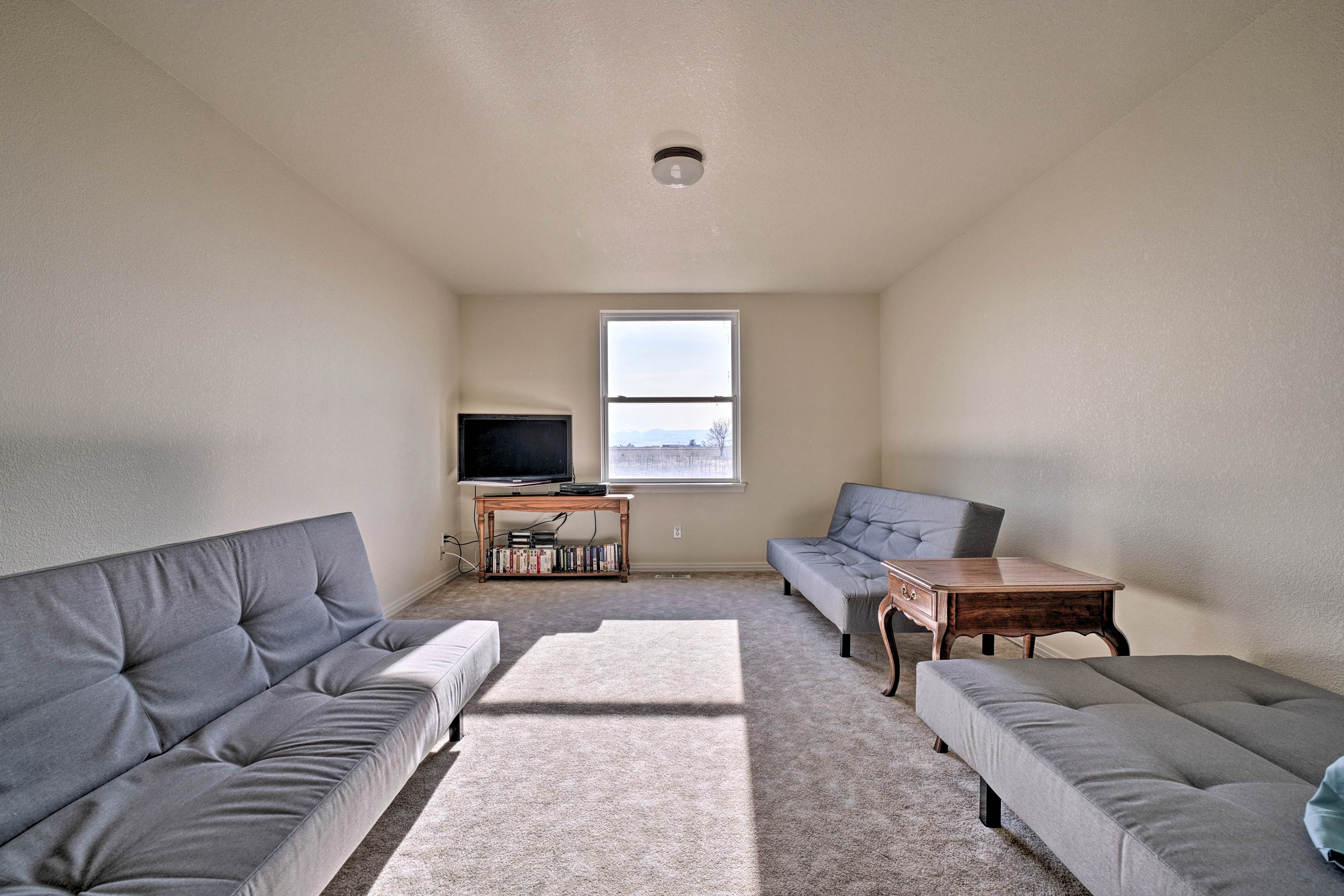 This bedroom is located through the loft.