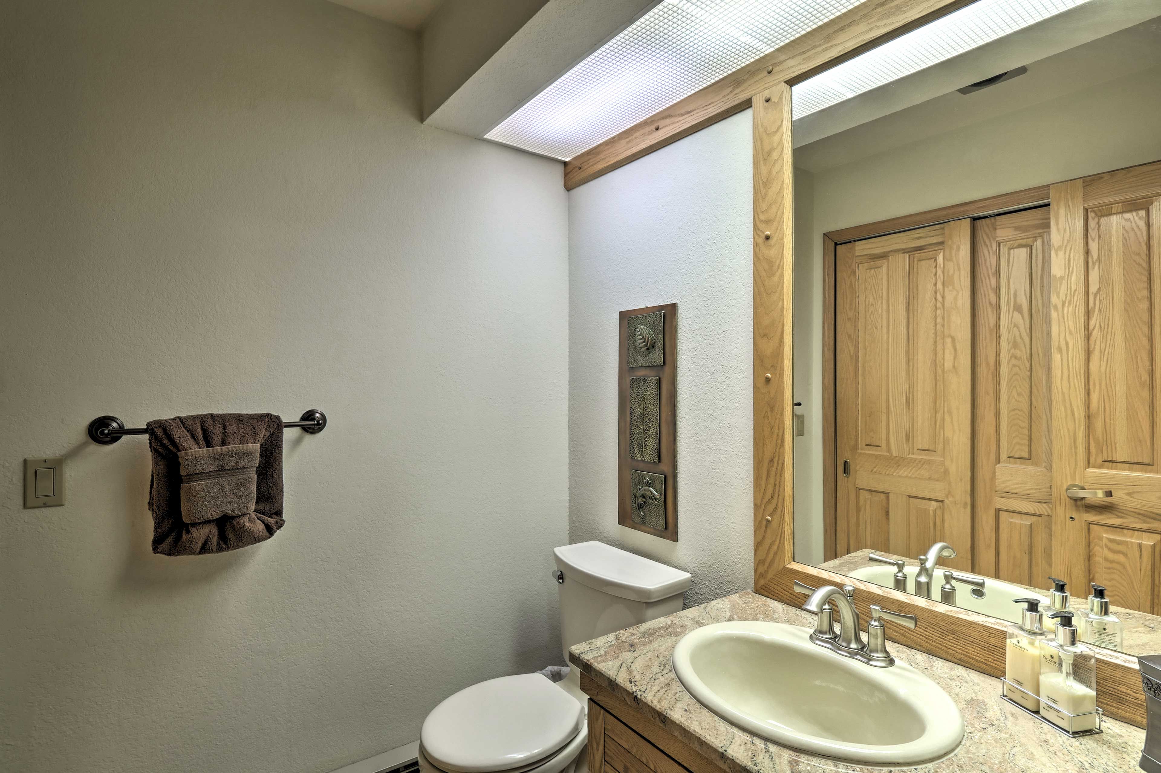 A half bath is located off the common area.