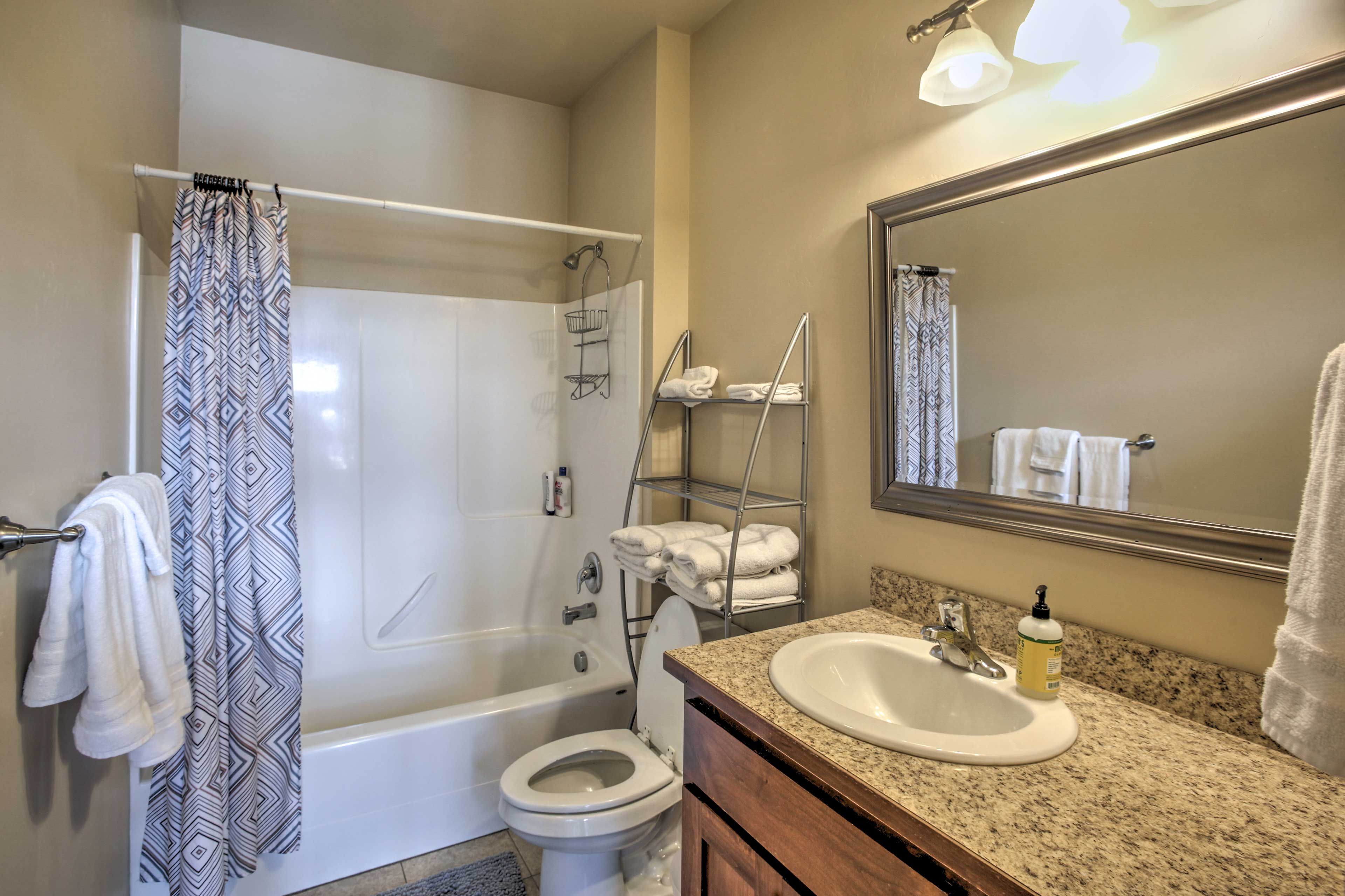 Rinse off with a shower or sink into the tub in the full bath.