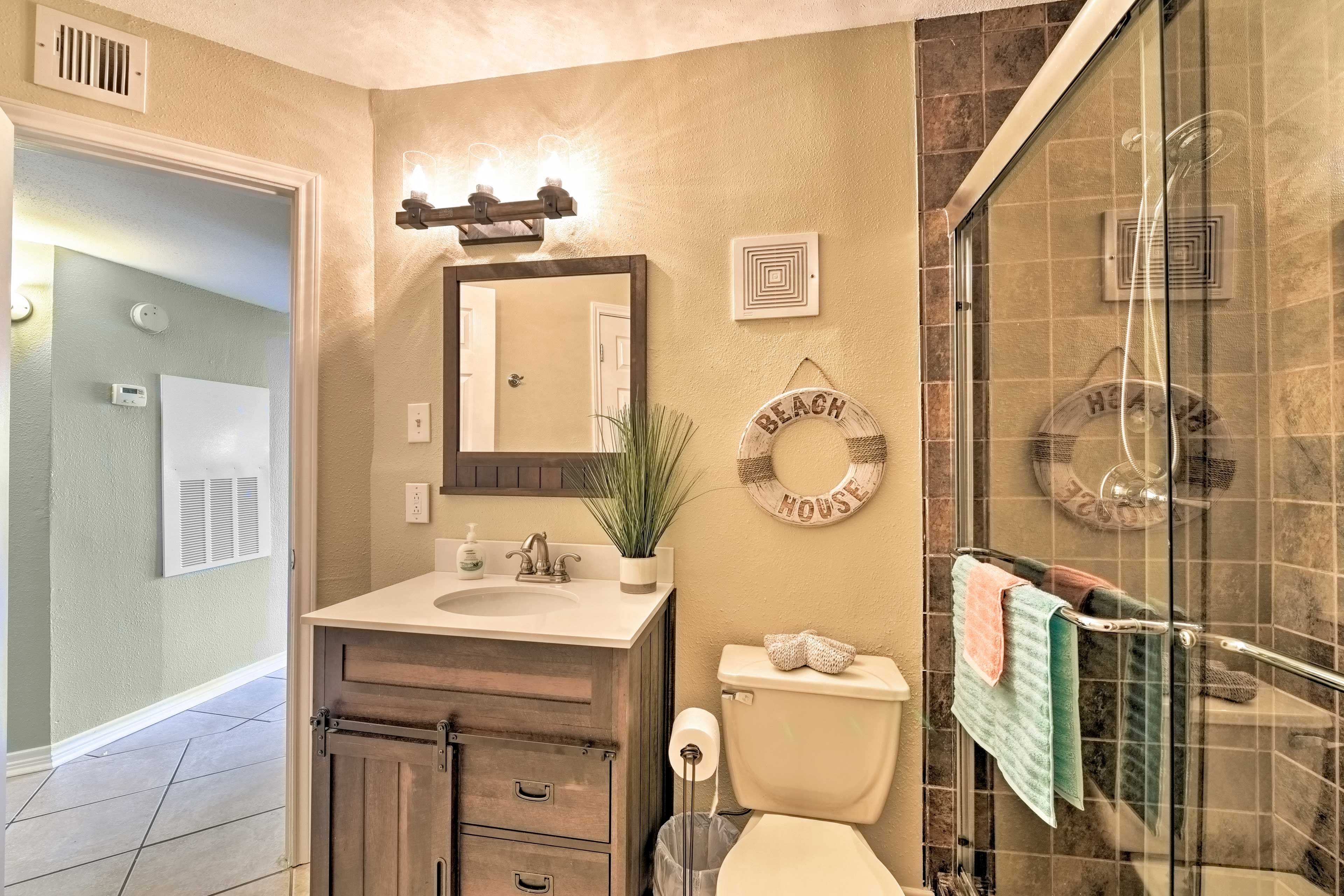 Freshen up in the upscale bathroom.