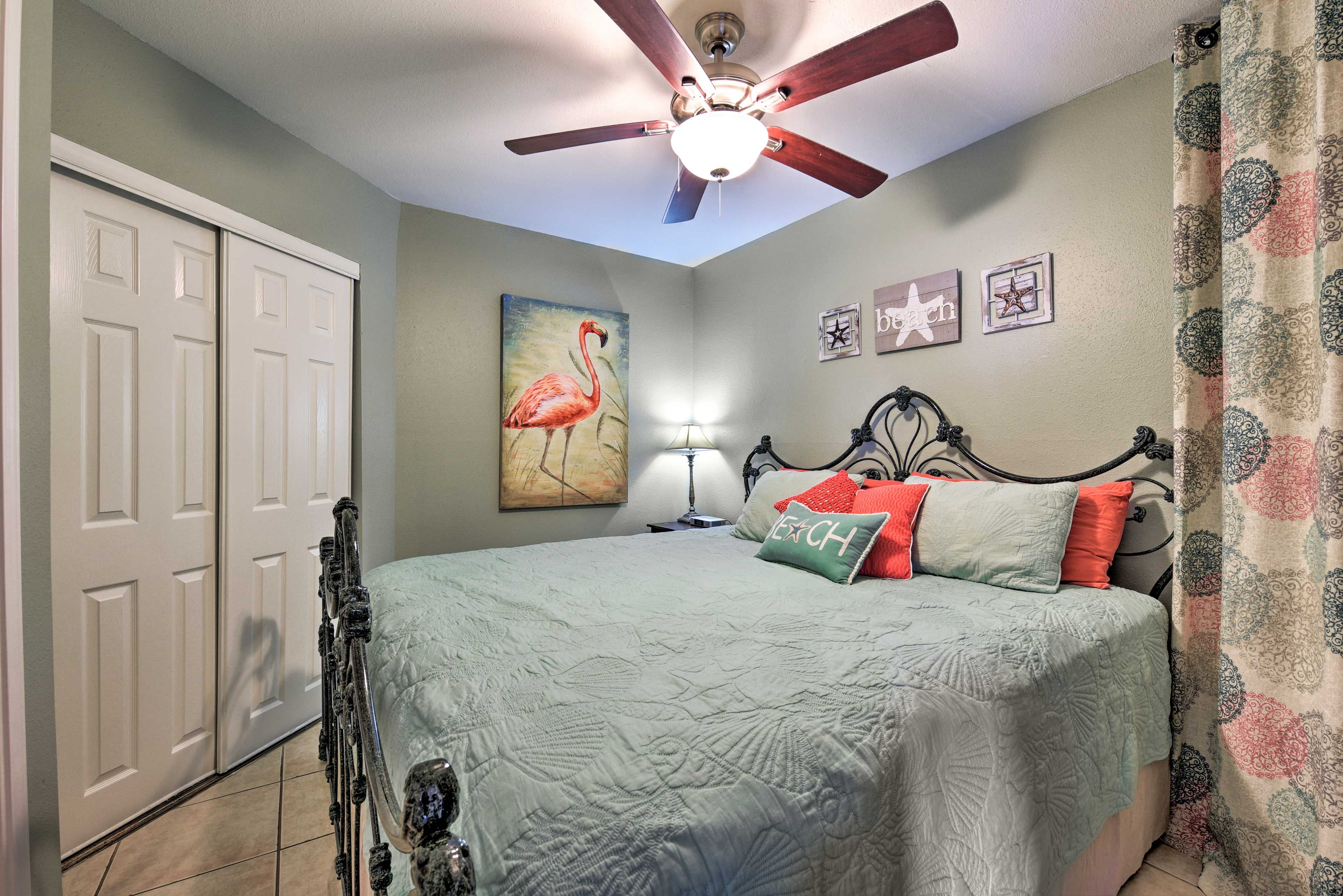 The bedroom houses a king bed.