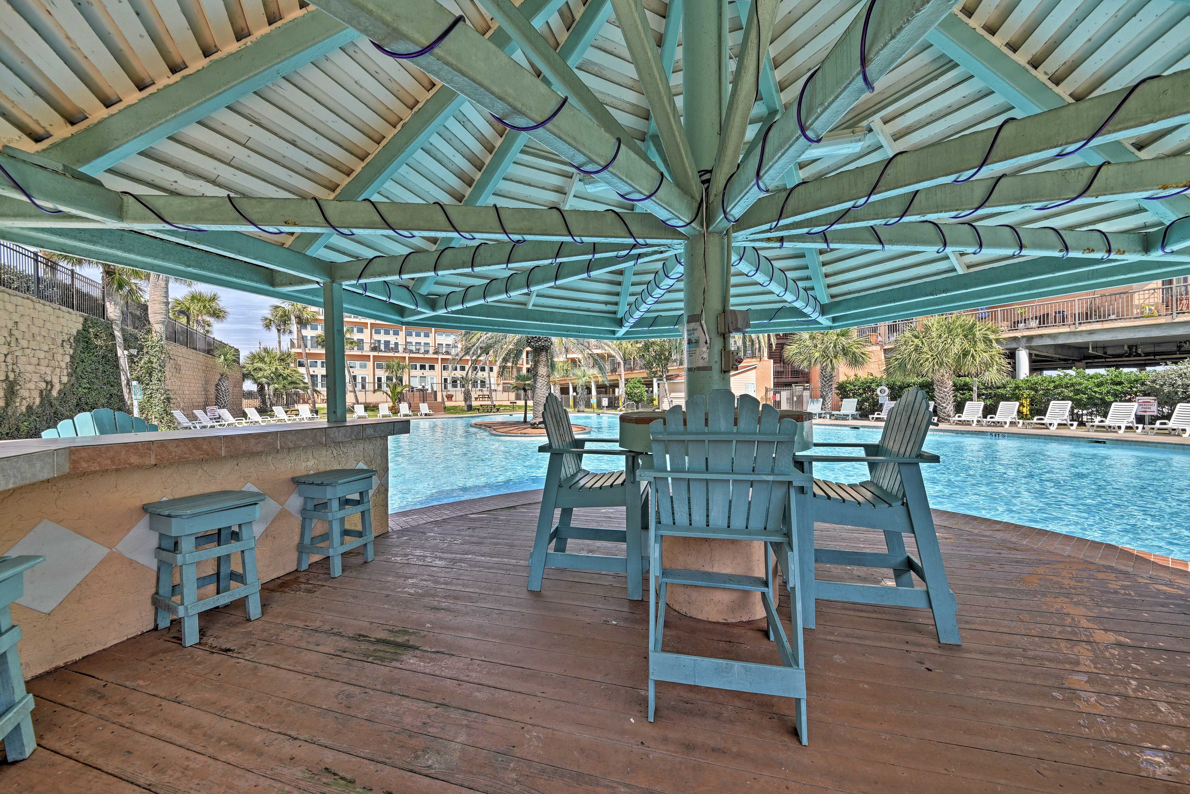Sip a refreshing mojito in the shade of the cabana.