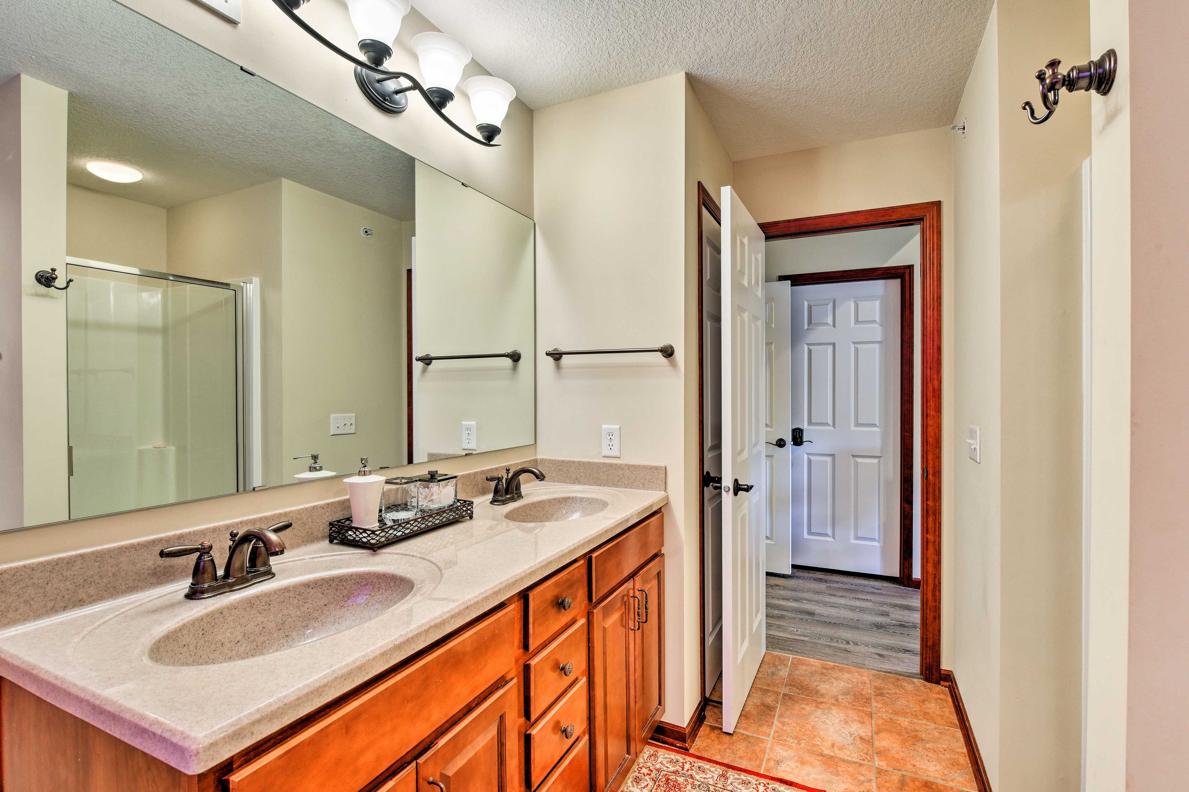 Stick to your daily routine at the dual-sink vanity.