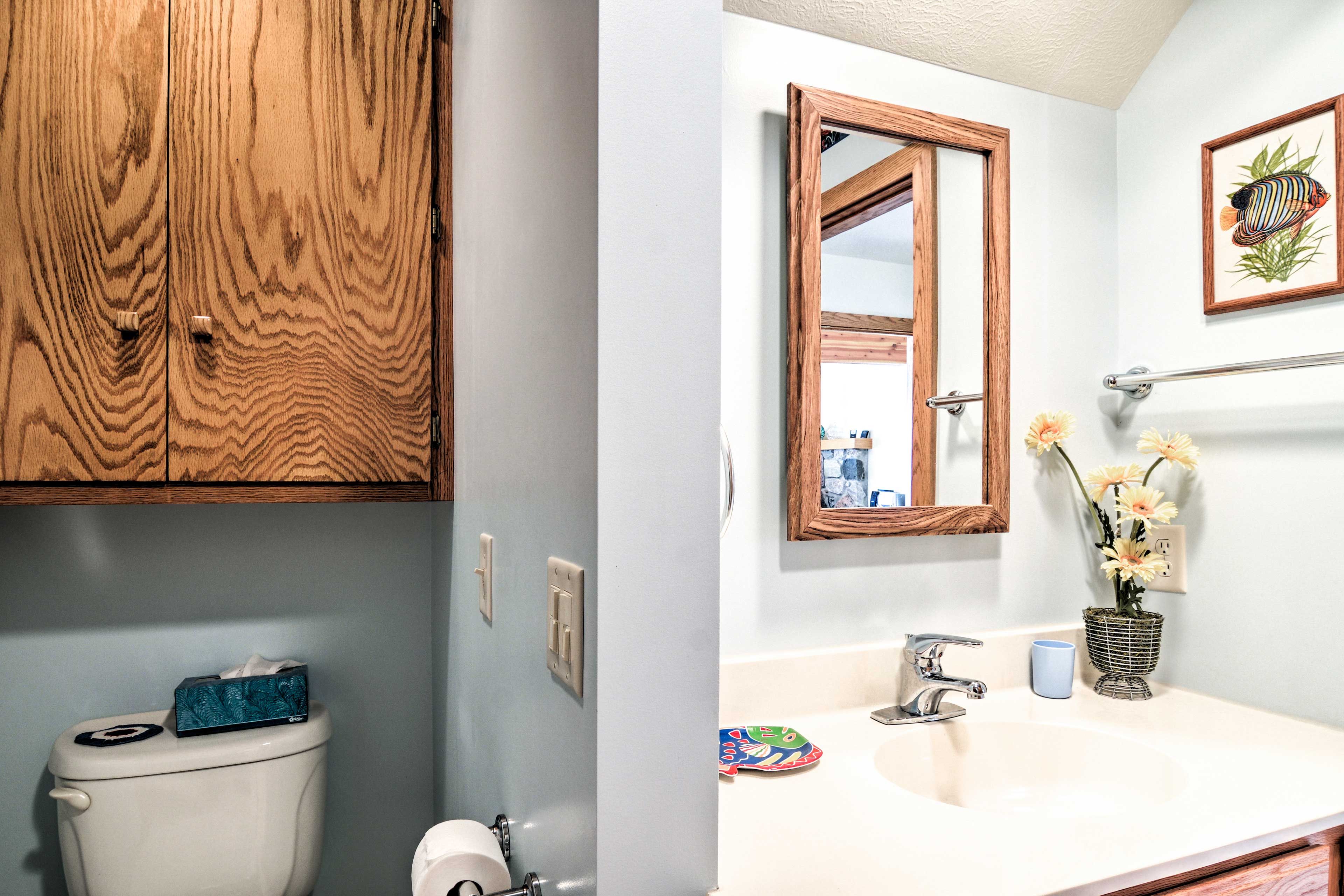 The second full bathroom features a single vanity.
