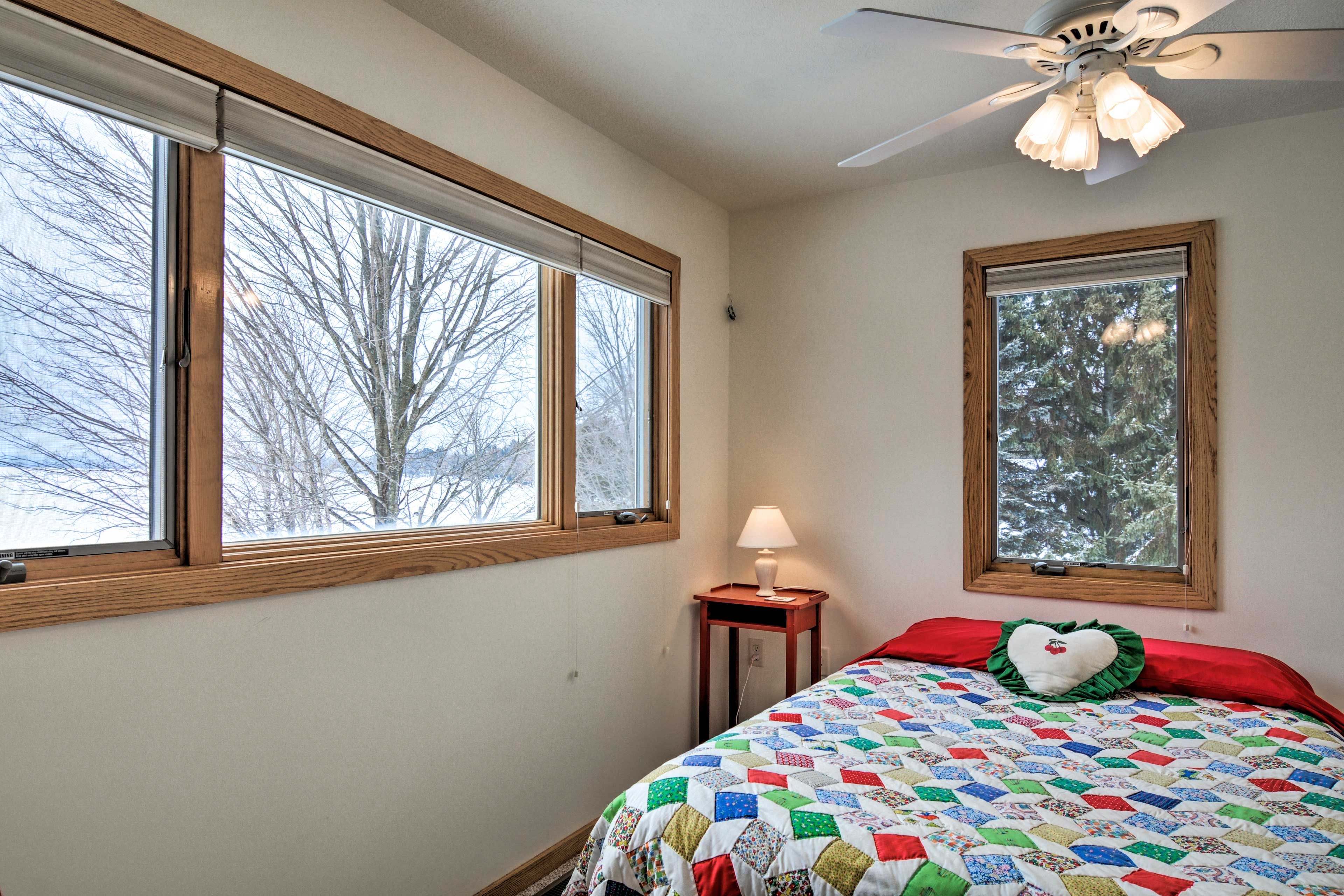 Two guests can snooze in the light & airy second bedroom.