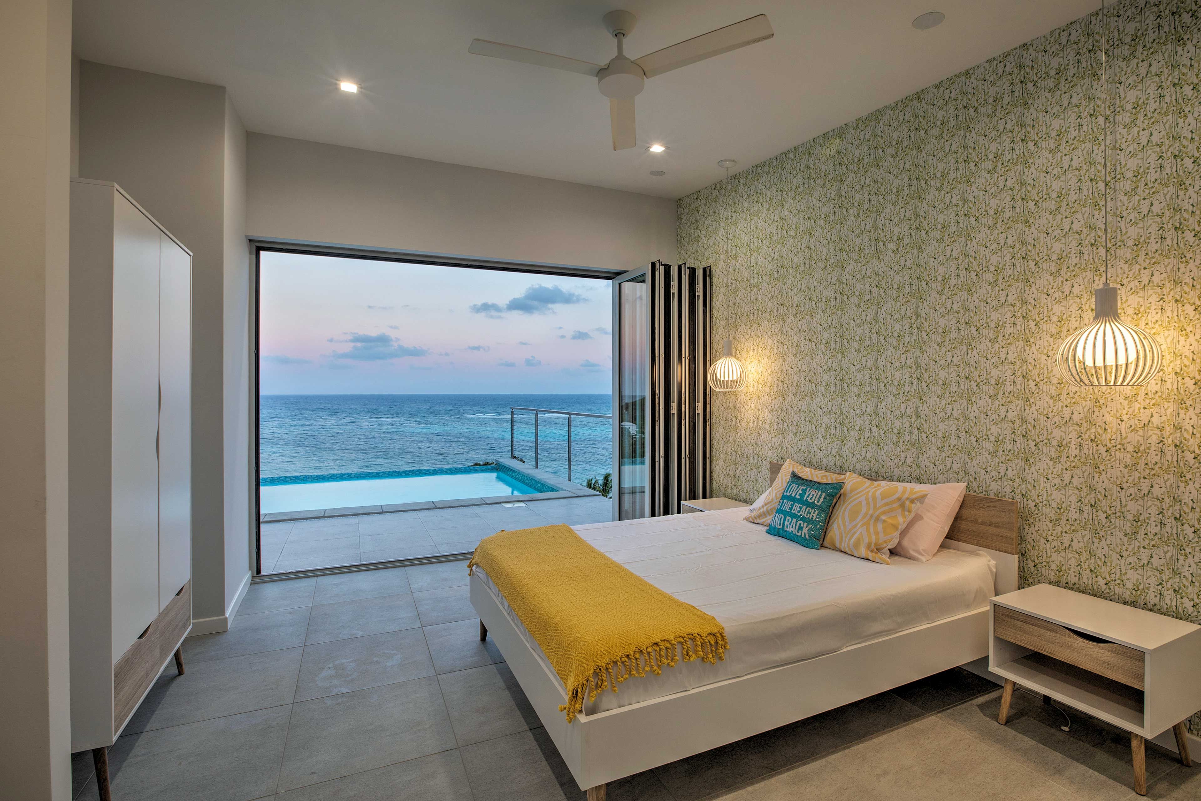 Bedroom 1 | Queen Bed | Patio Access | En-Suite Bathroom