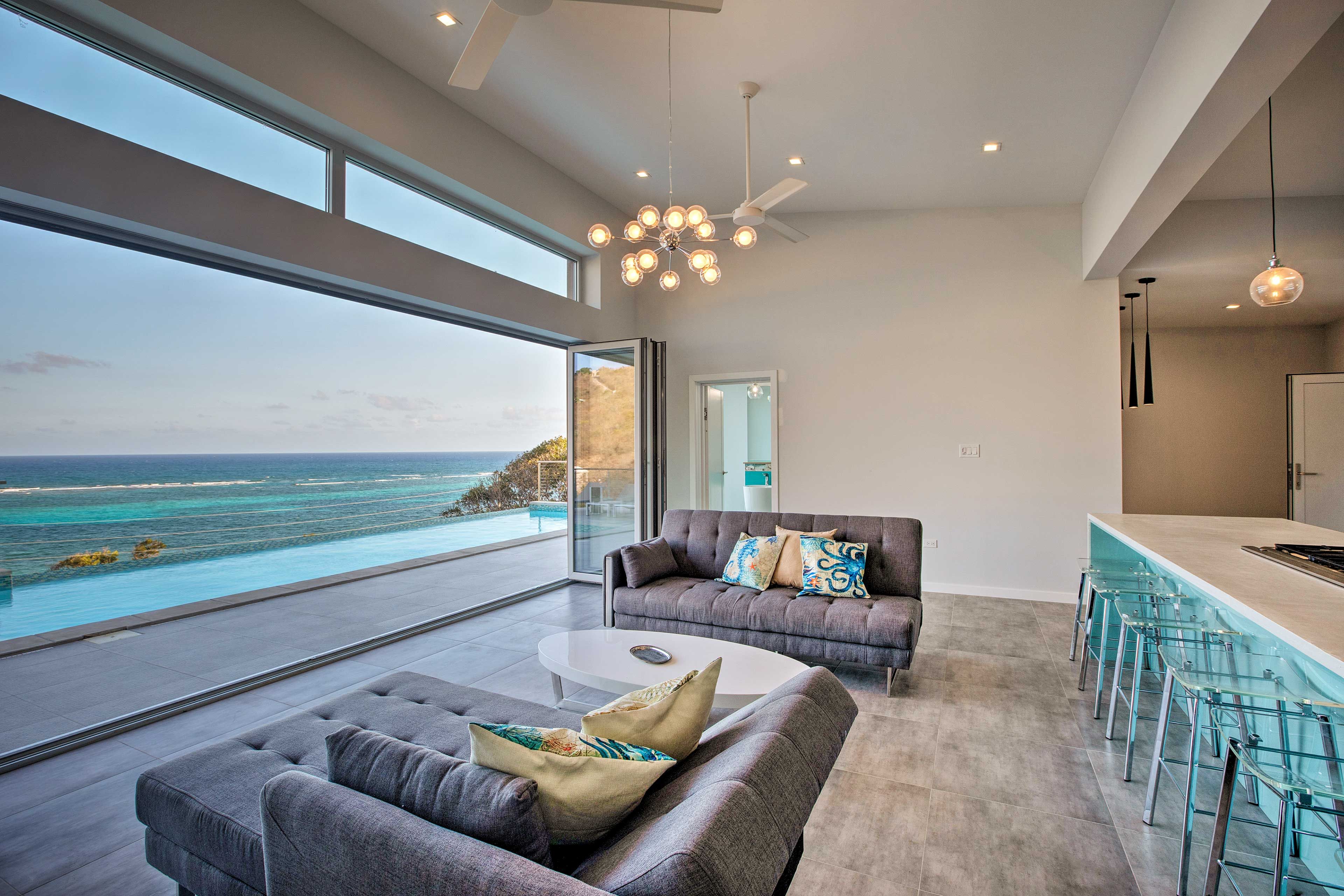 Interior | Open Floor Plan | Free WiFi | Wall-to-Wall Glass Doors