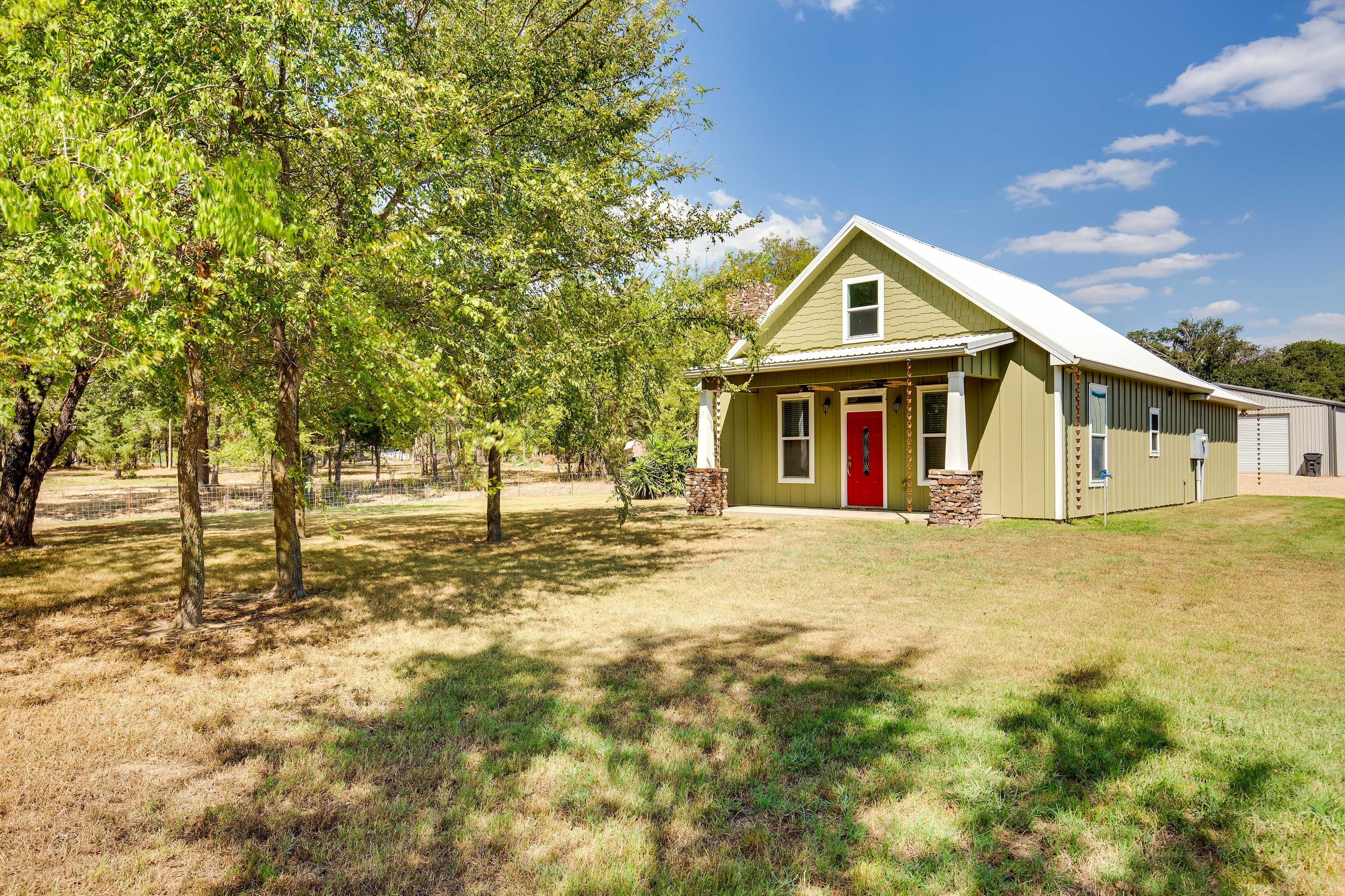 Front Exterior | Spacious Yard
