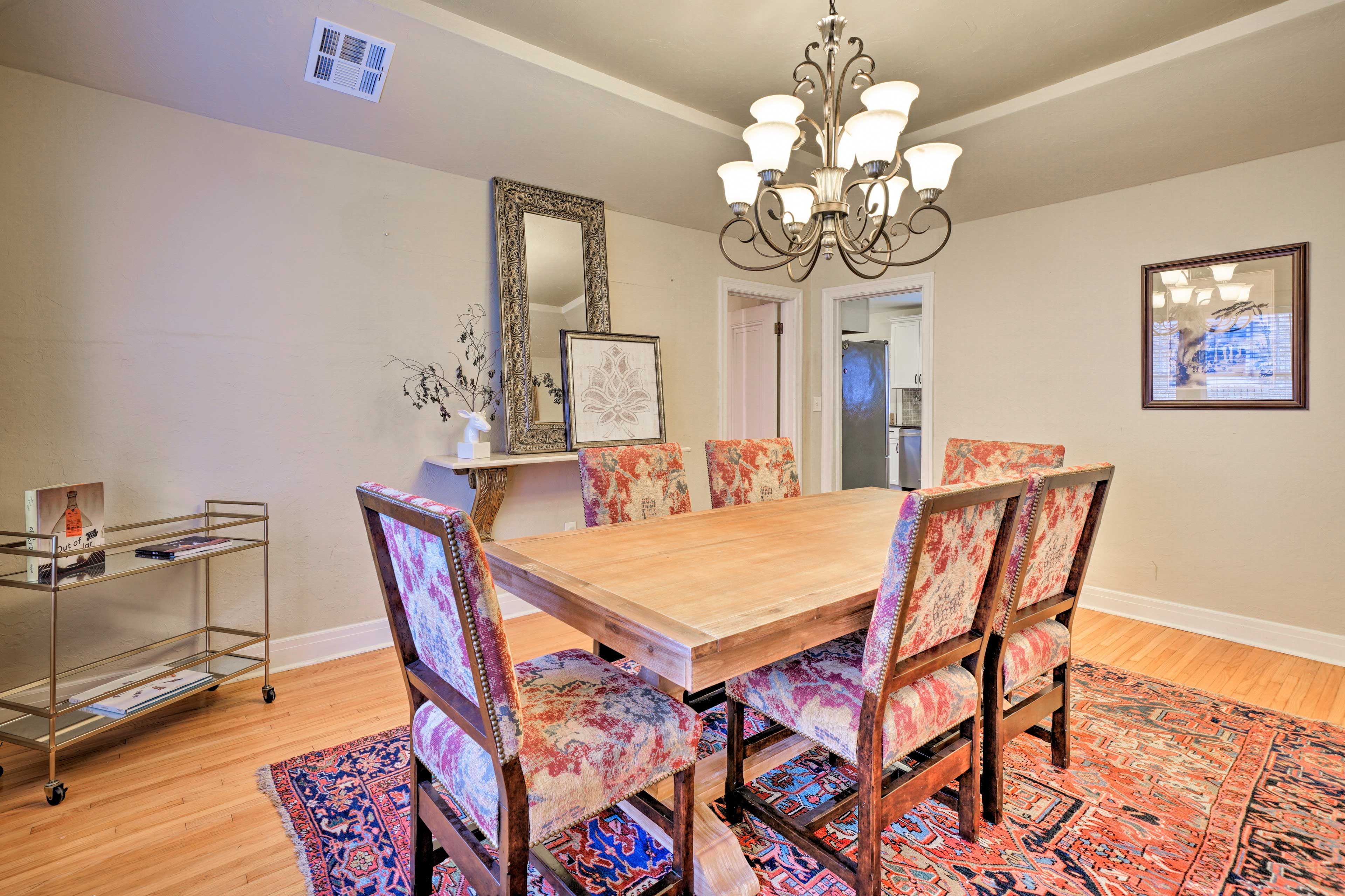 Enjoy meals at the 6-person dining table.