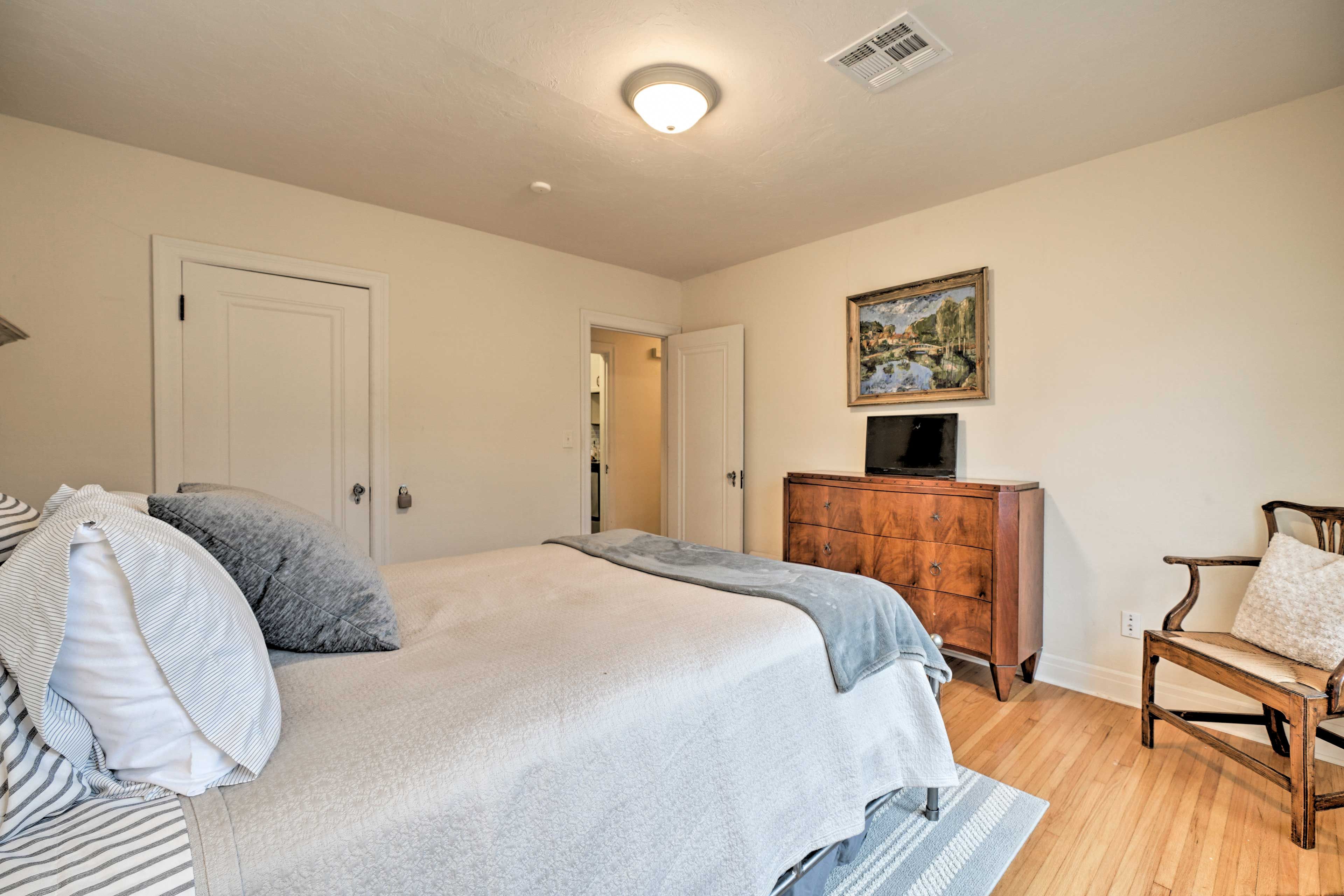 Antique details like original hardwood floors and glass doorknobs add charm!