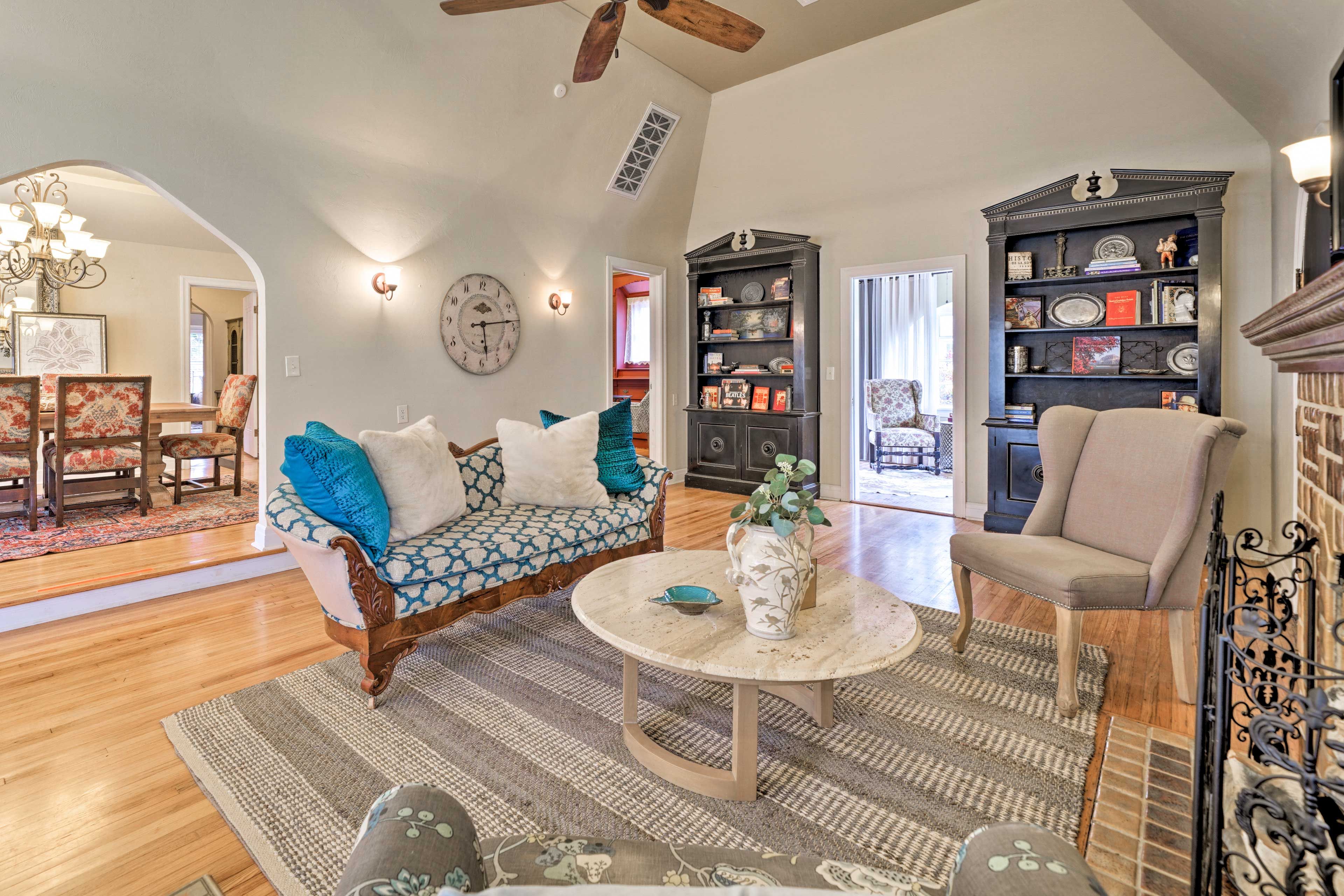 Relax on the vintage sofa or wingback chairs!