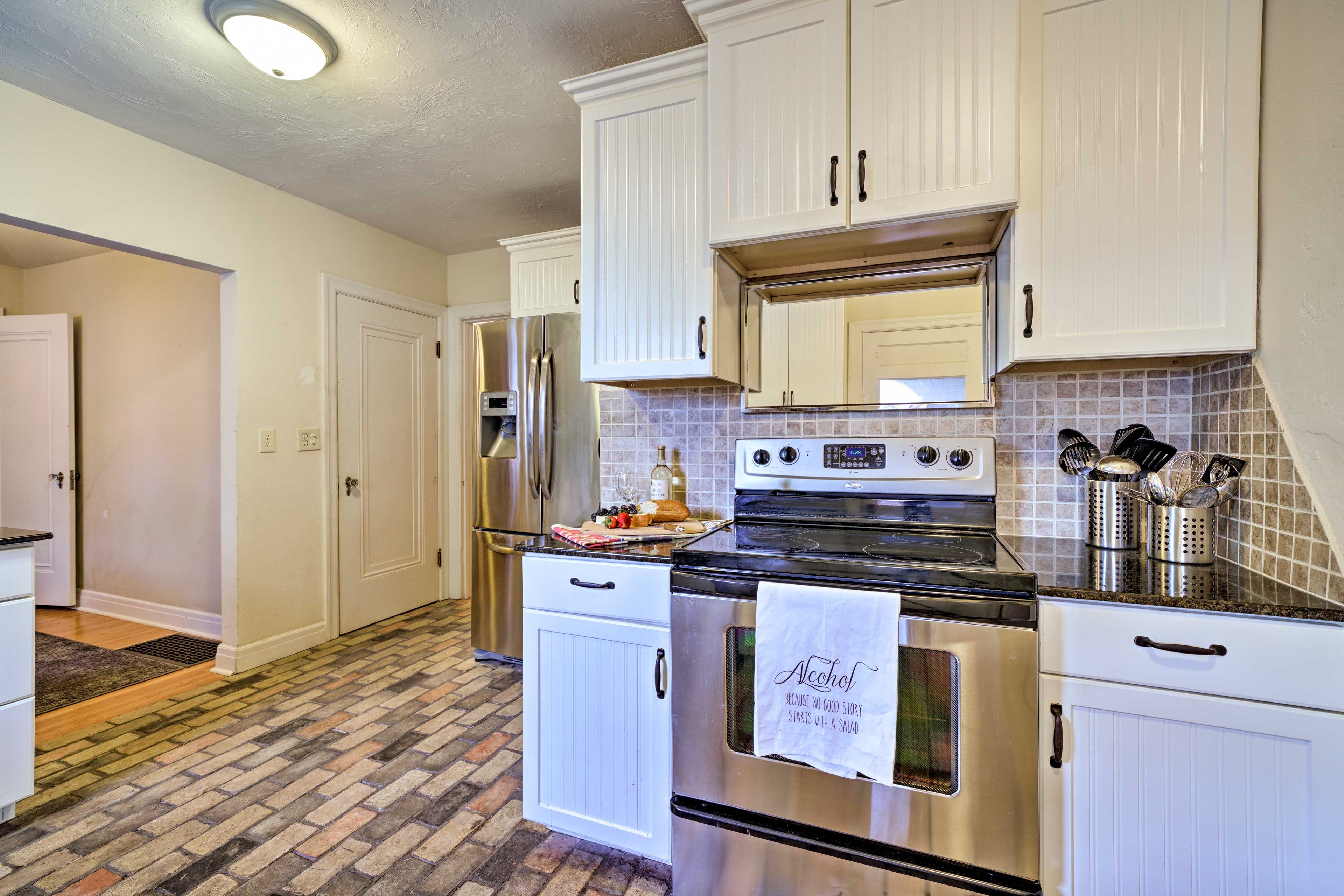 The kitchen boasts stainless steel appliances.