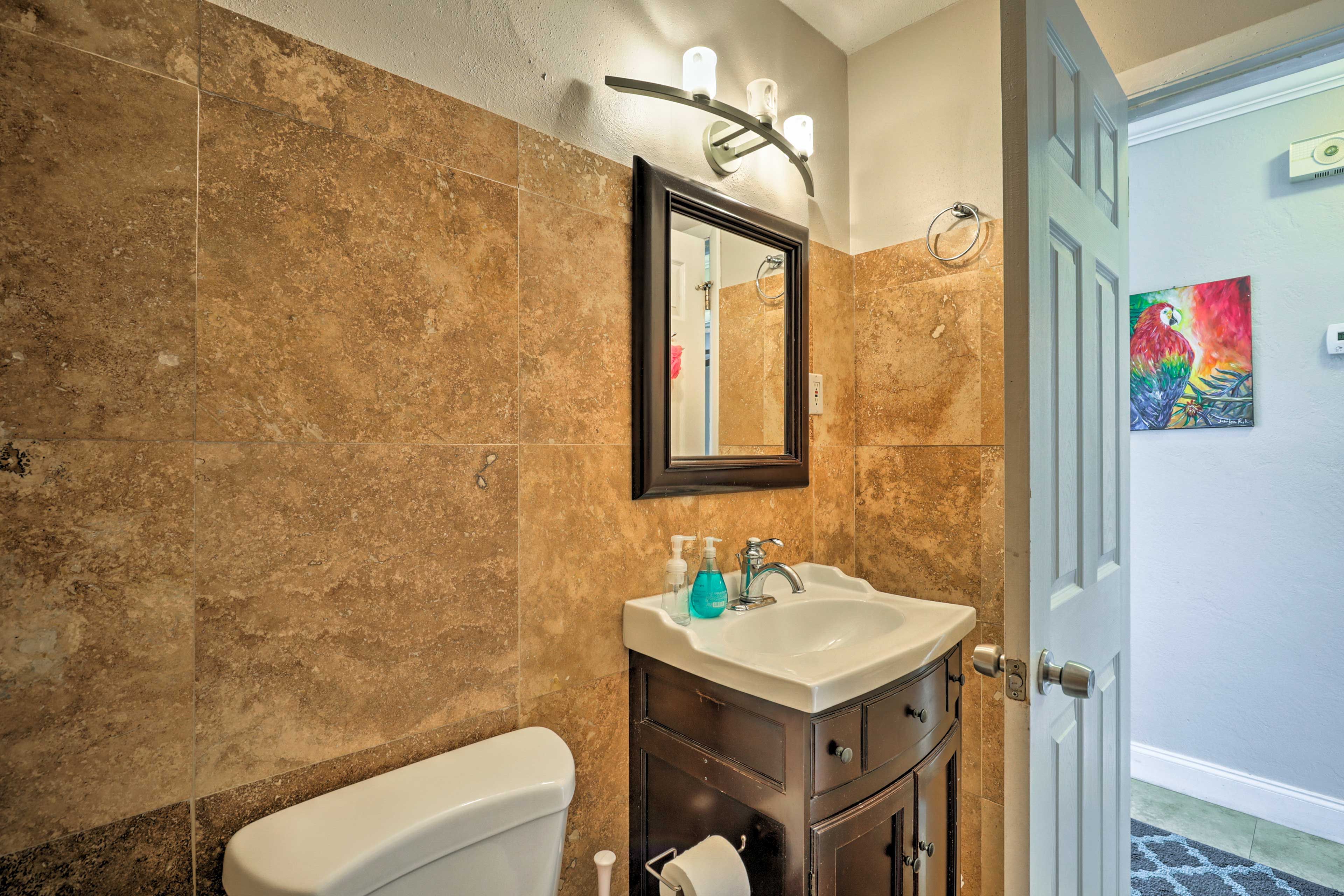 Get cleaned up in the full bathroom.