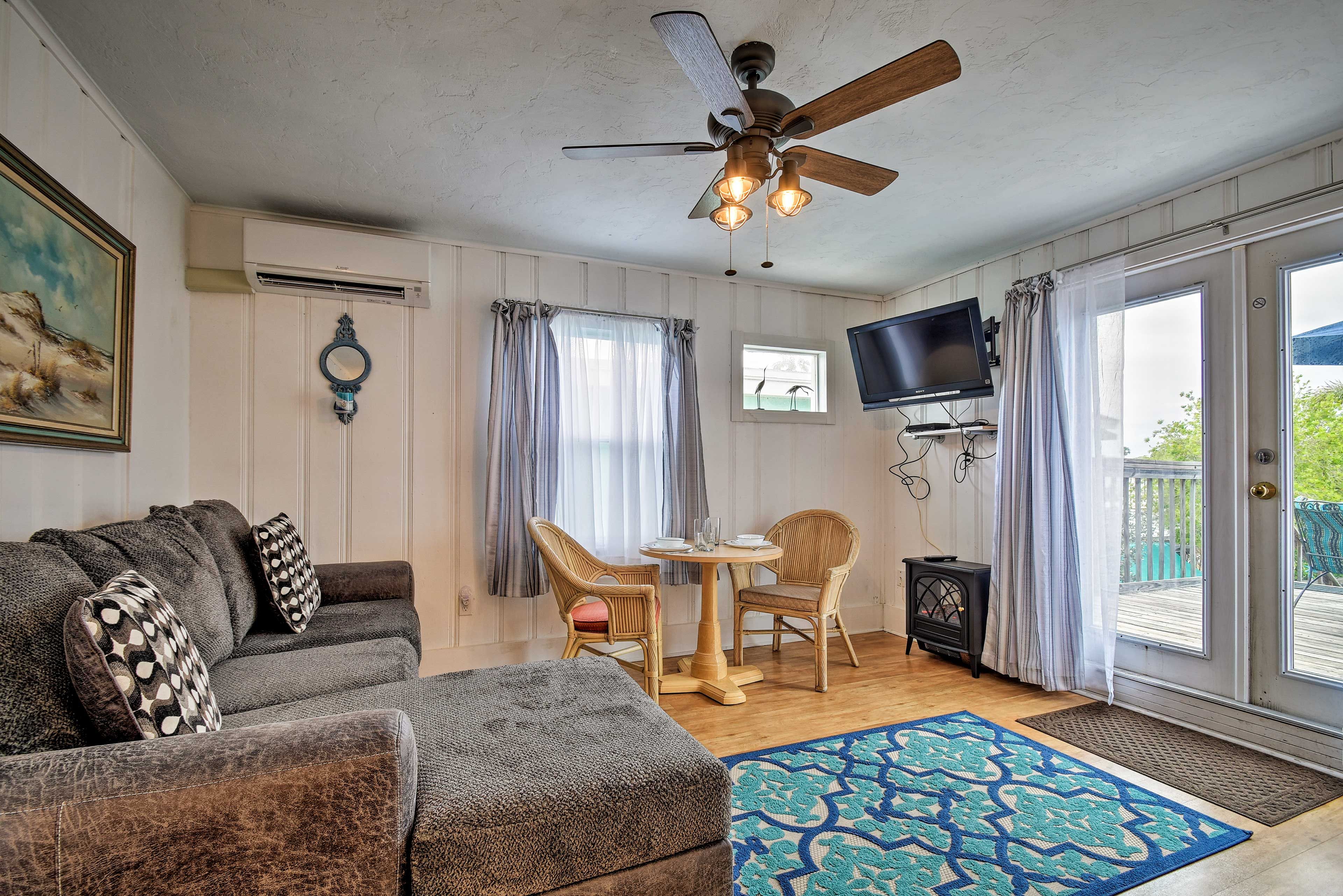 Kick back with your feet up in the A/C as you watch the flat-screen TV.