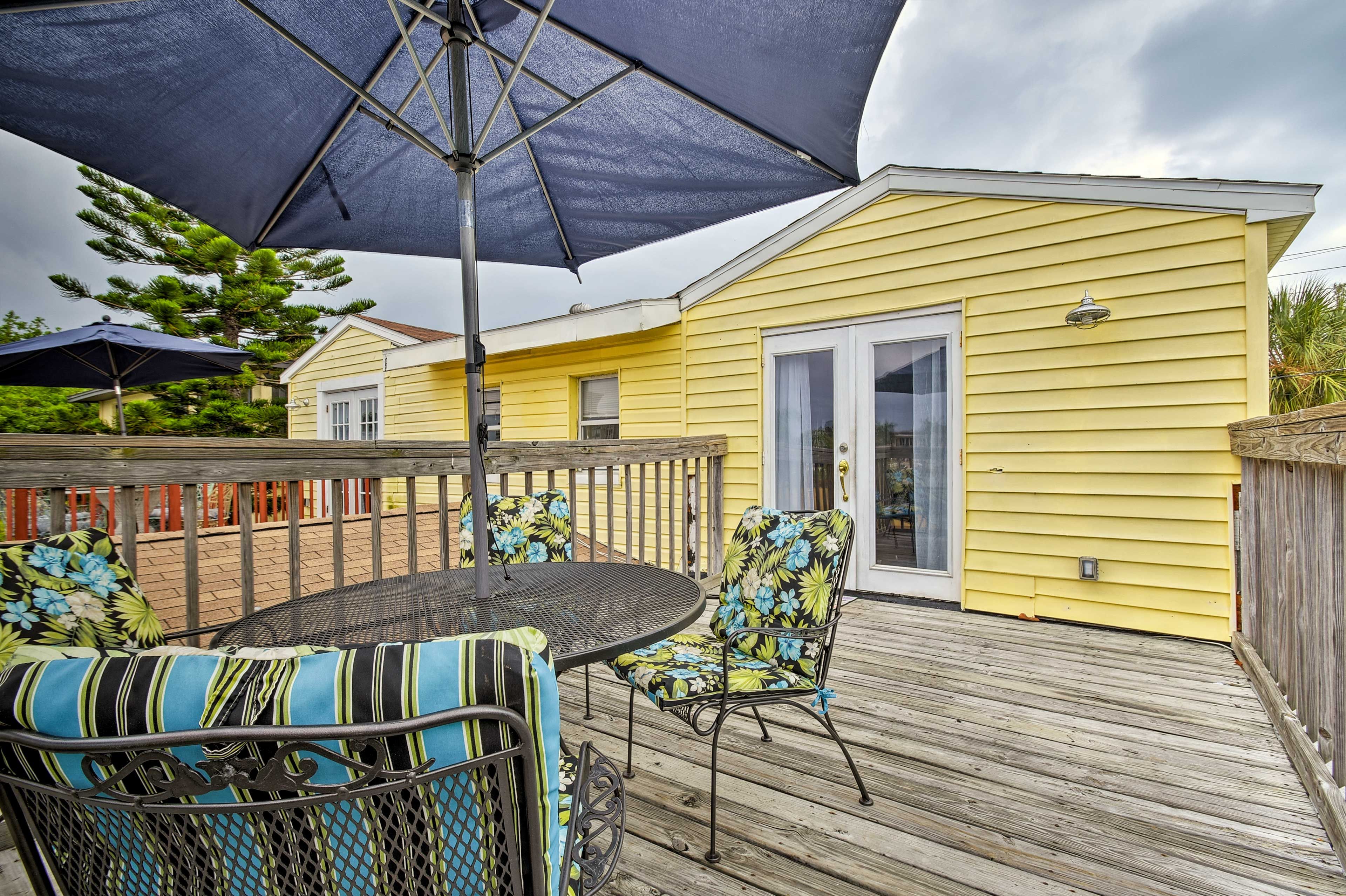 Step right outside the condo to dine on the patio table.
