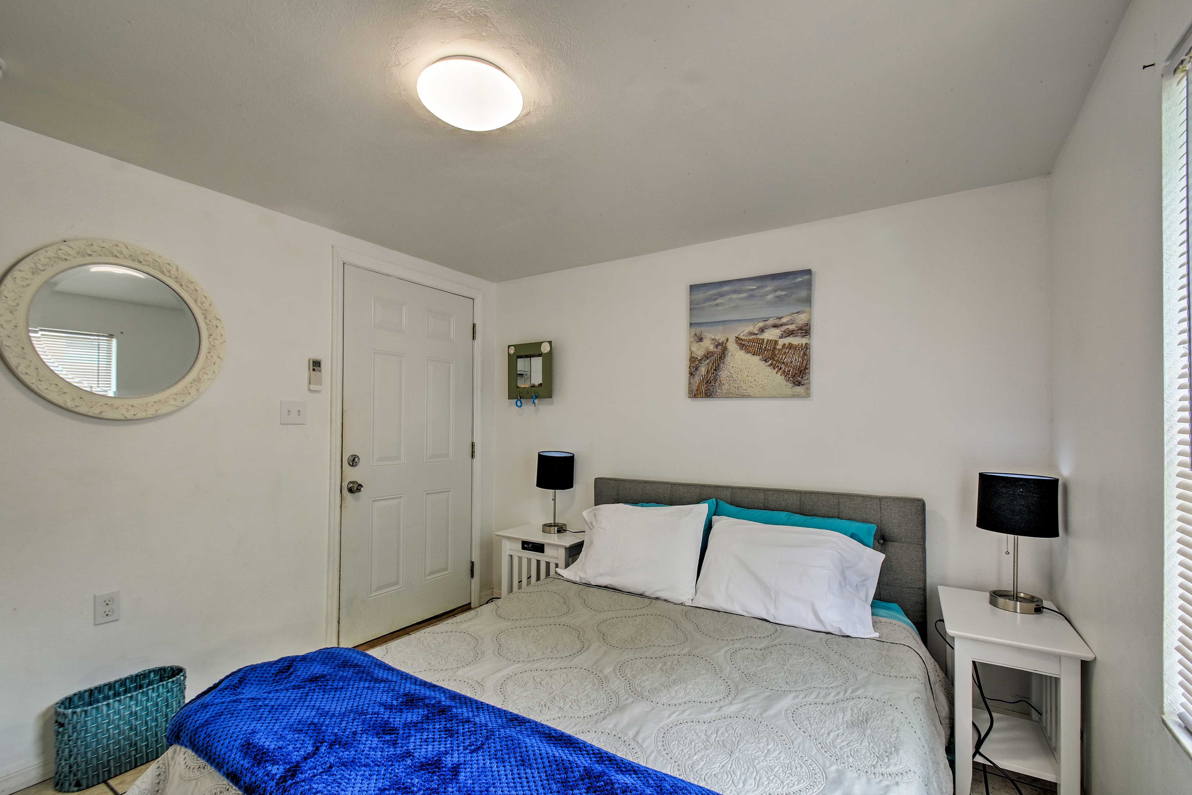 Cozy up on the queen bed each night.