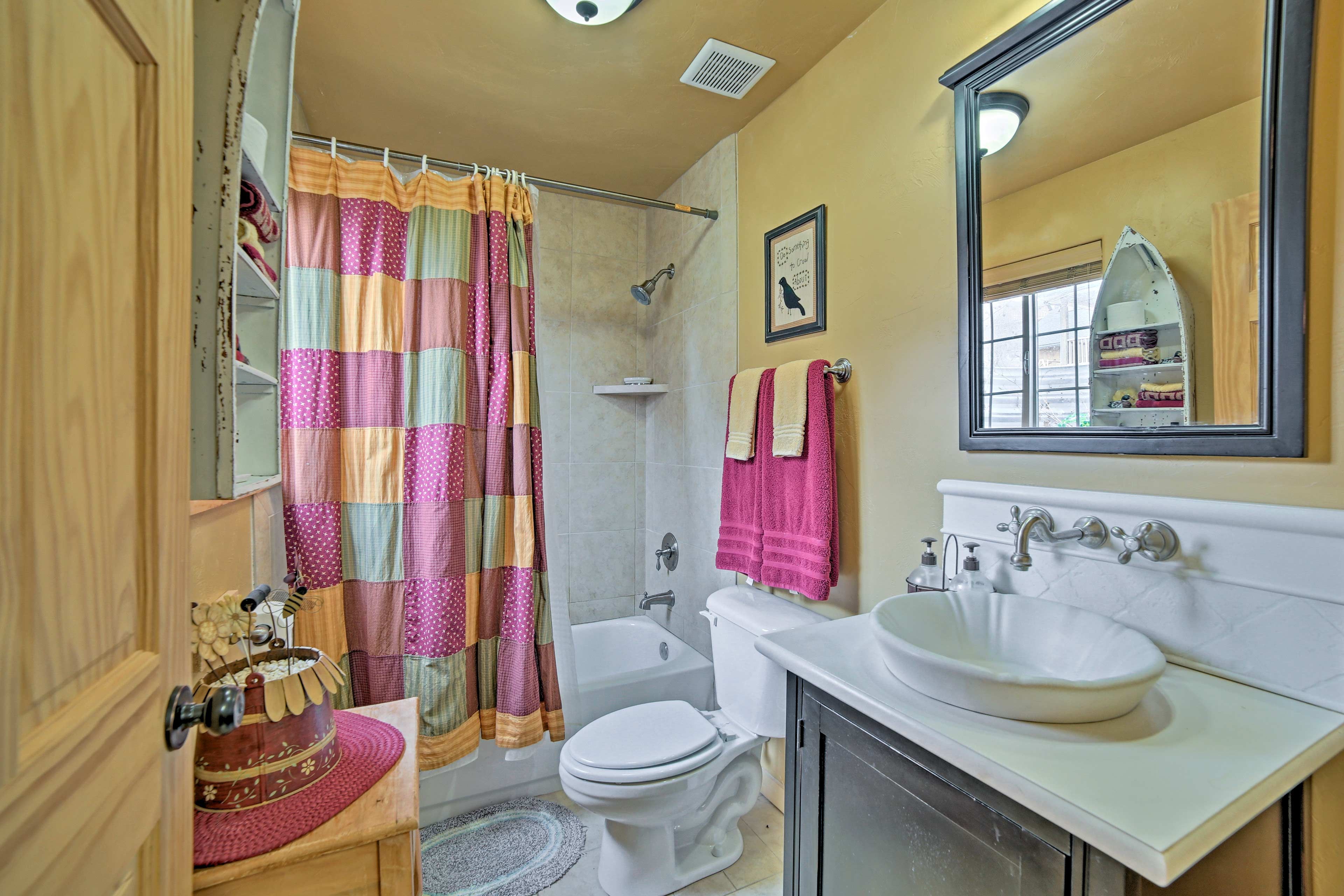 Wash your worries away as you take a soothing soak in the roomy bathtub.
