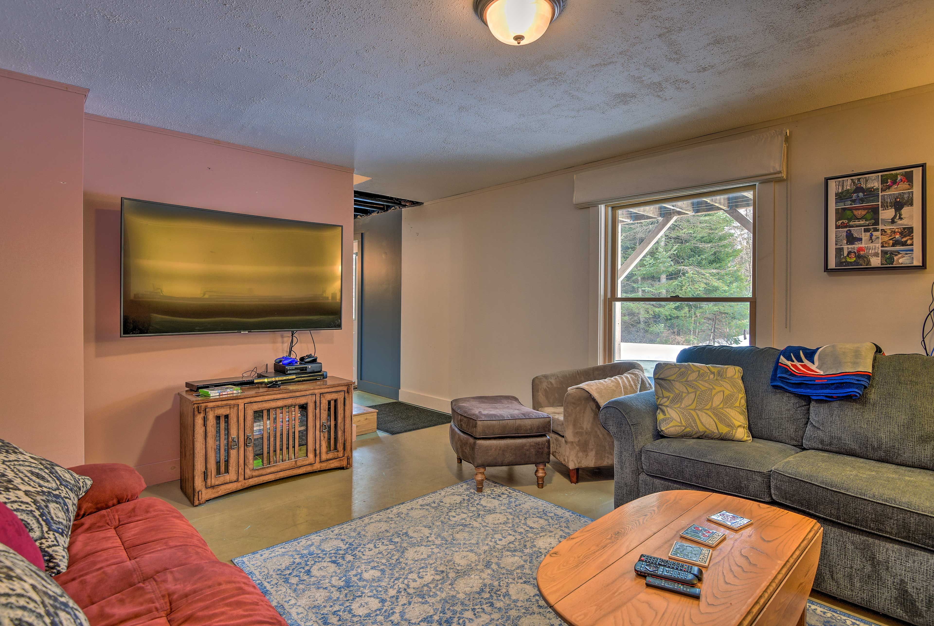 Living Room | 65-Inch Curved TV | Free WiFi