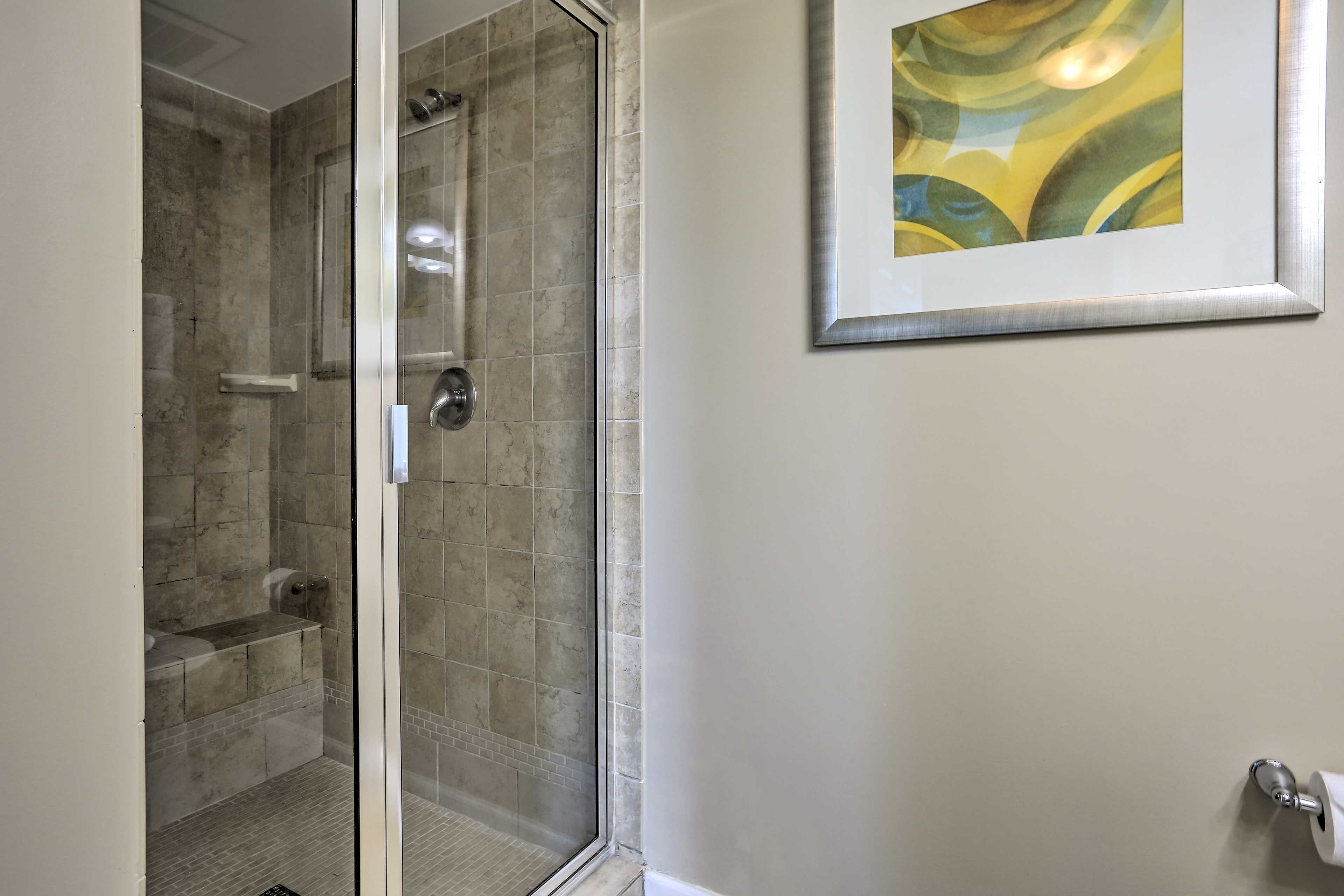 Rinse away the day in the tile-filled shower.