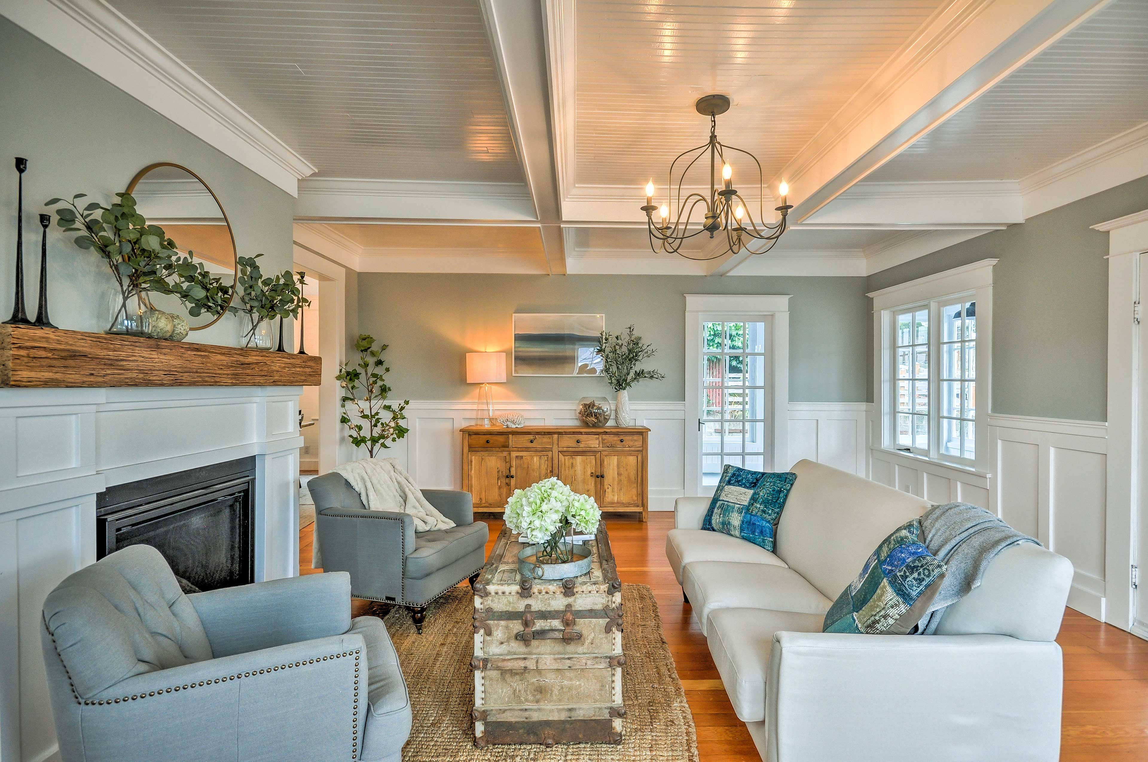 Come inside and cozy up in front of the fireplace in this spacious living area