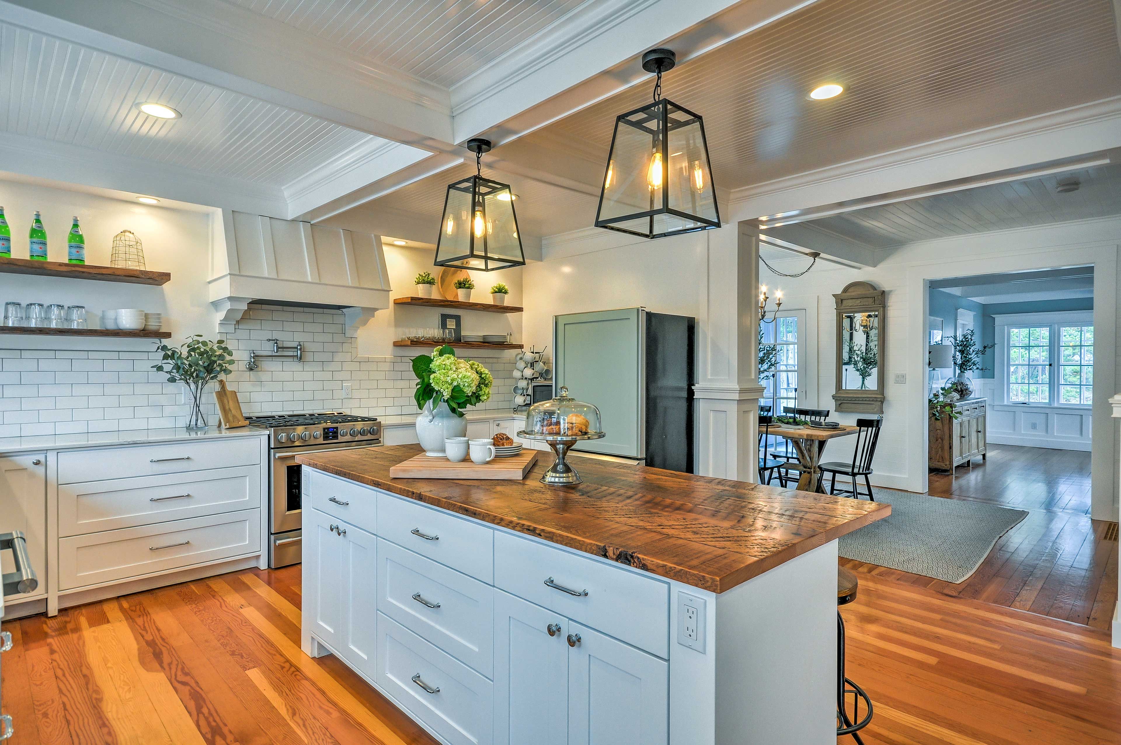 The kitchen comes fully equipped with stainless steel appliances.