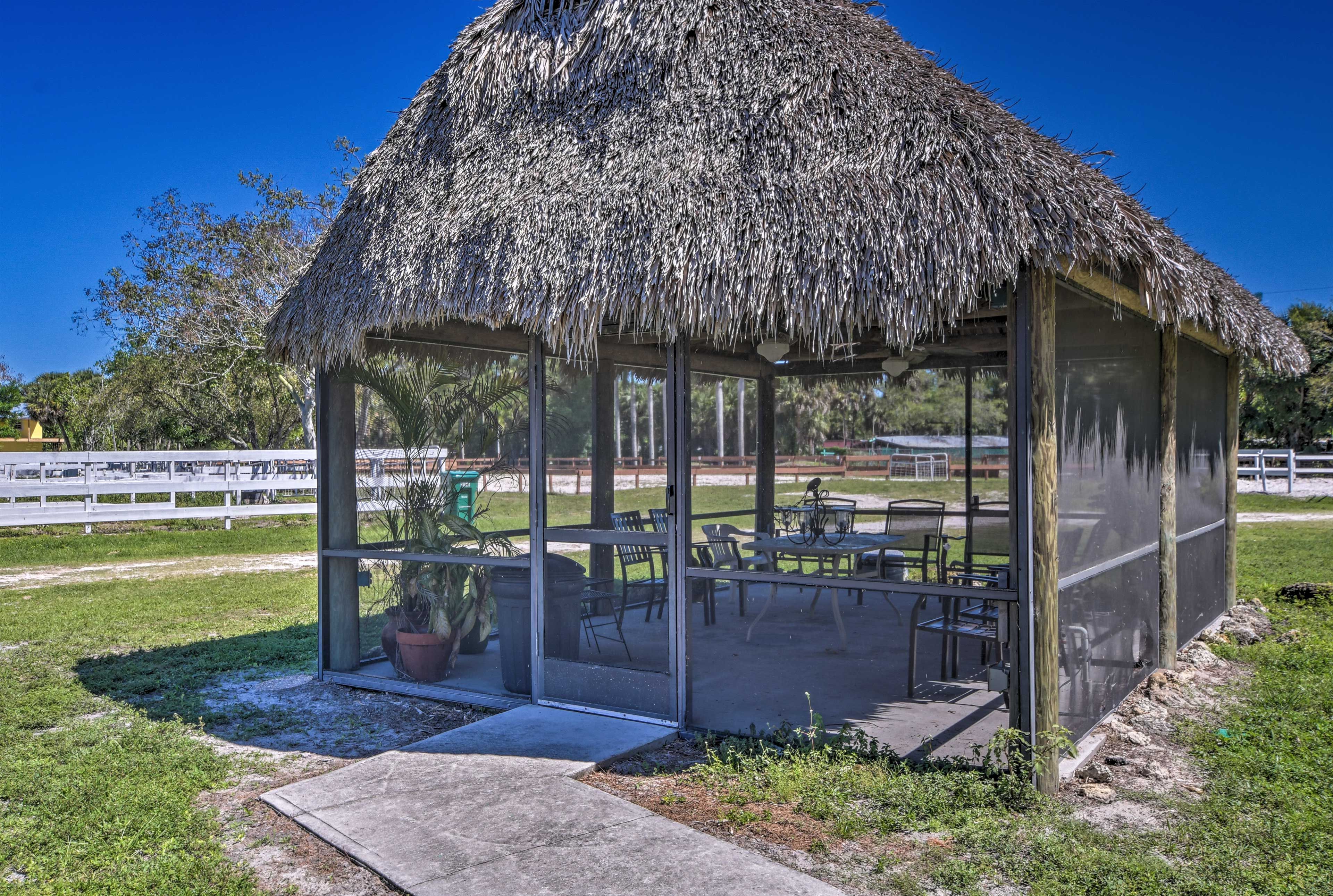 A second screened-in living area provides more places to hang out.