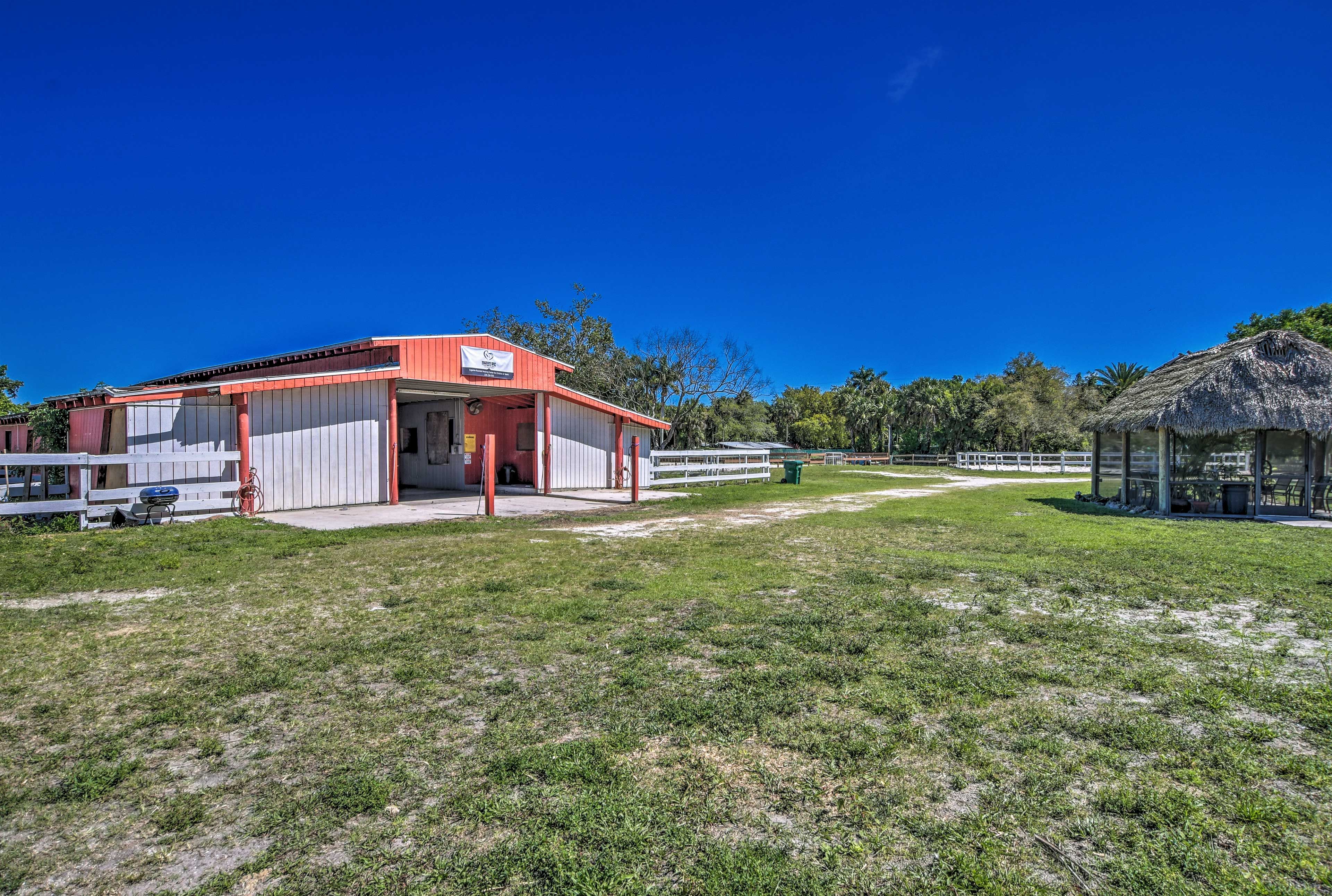 Bring your horses; the property includes 16 stables!