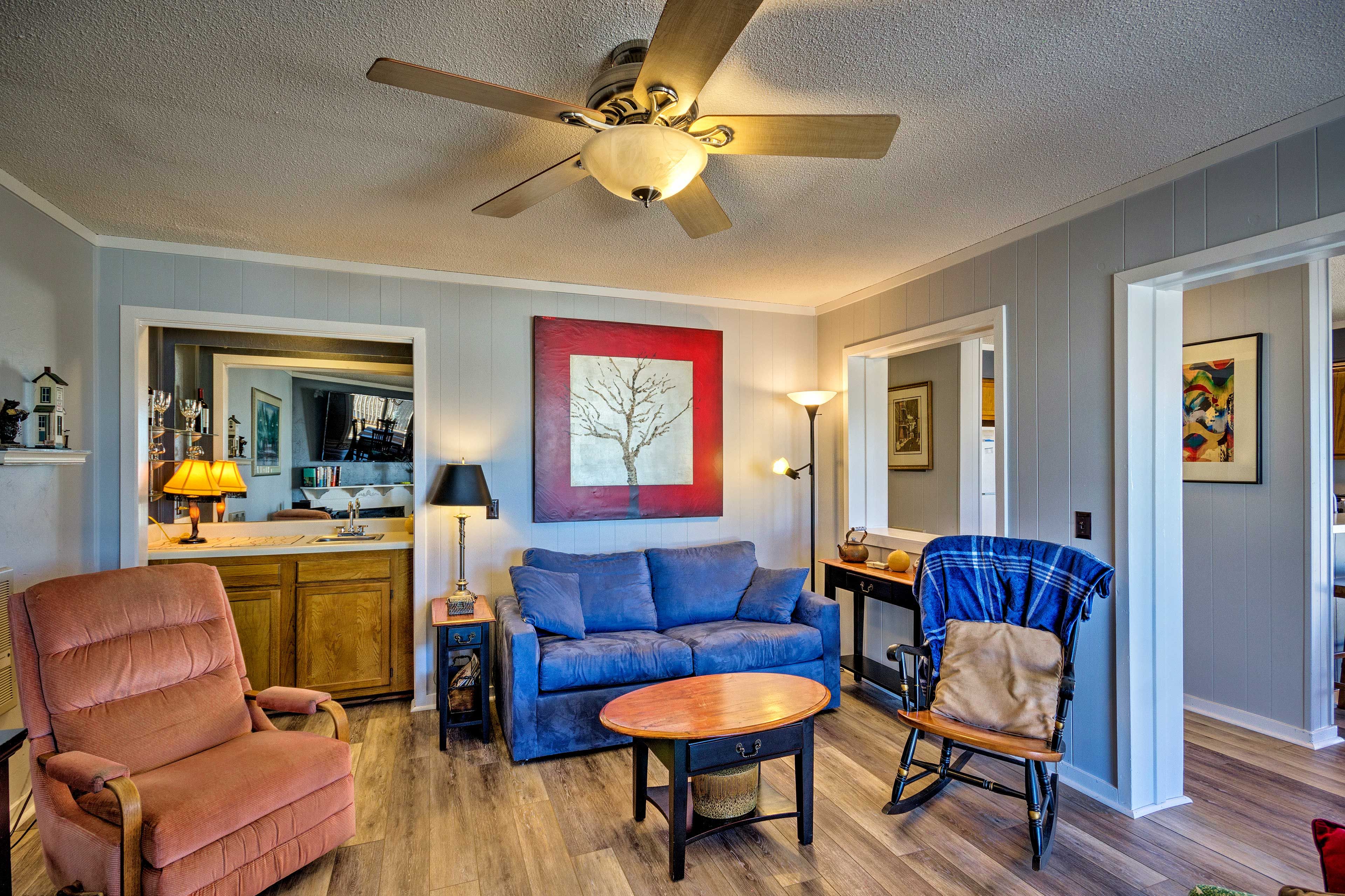 Lounge on the couch and enjoy the warmth of the wood-burning fireplace.