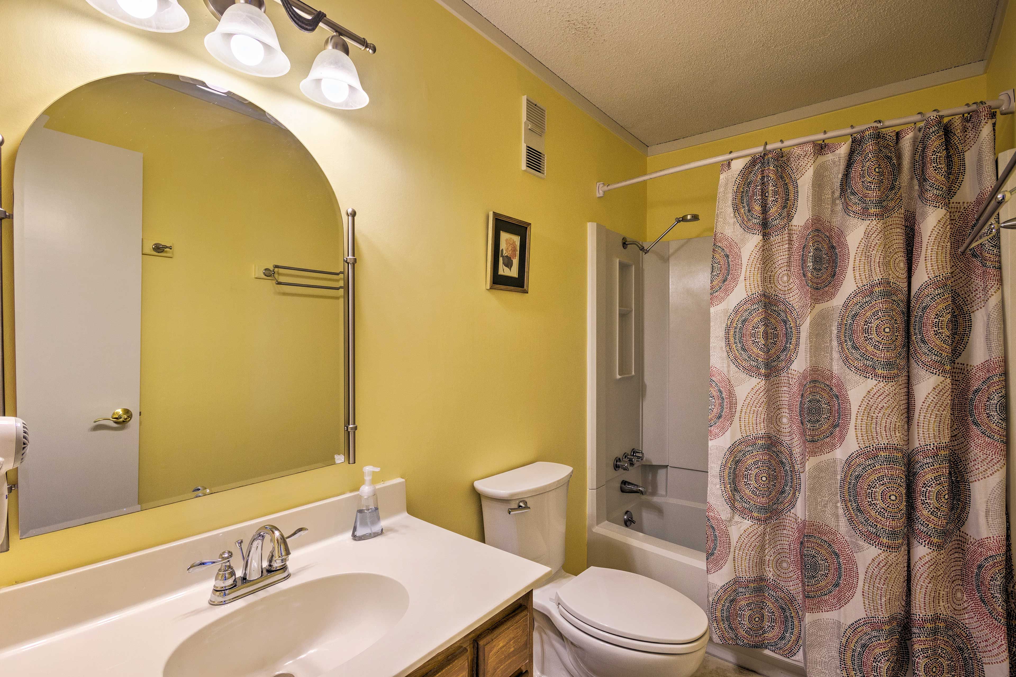Freshen up in the shower/tub combo.