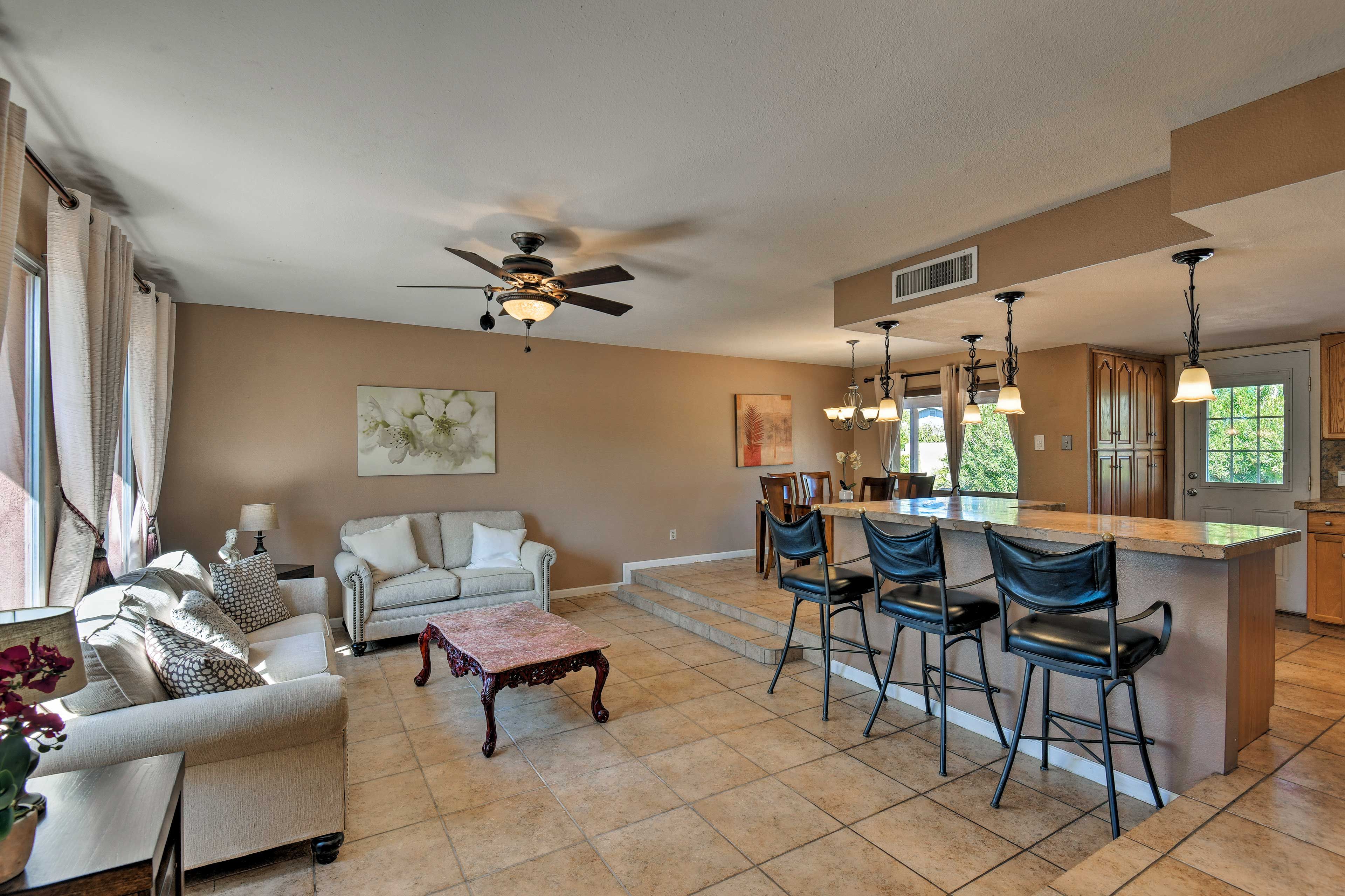 Relax in the family room or at the 3-person granite-topped breakfast bar.
