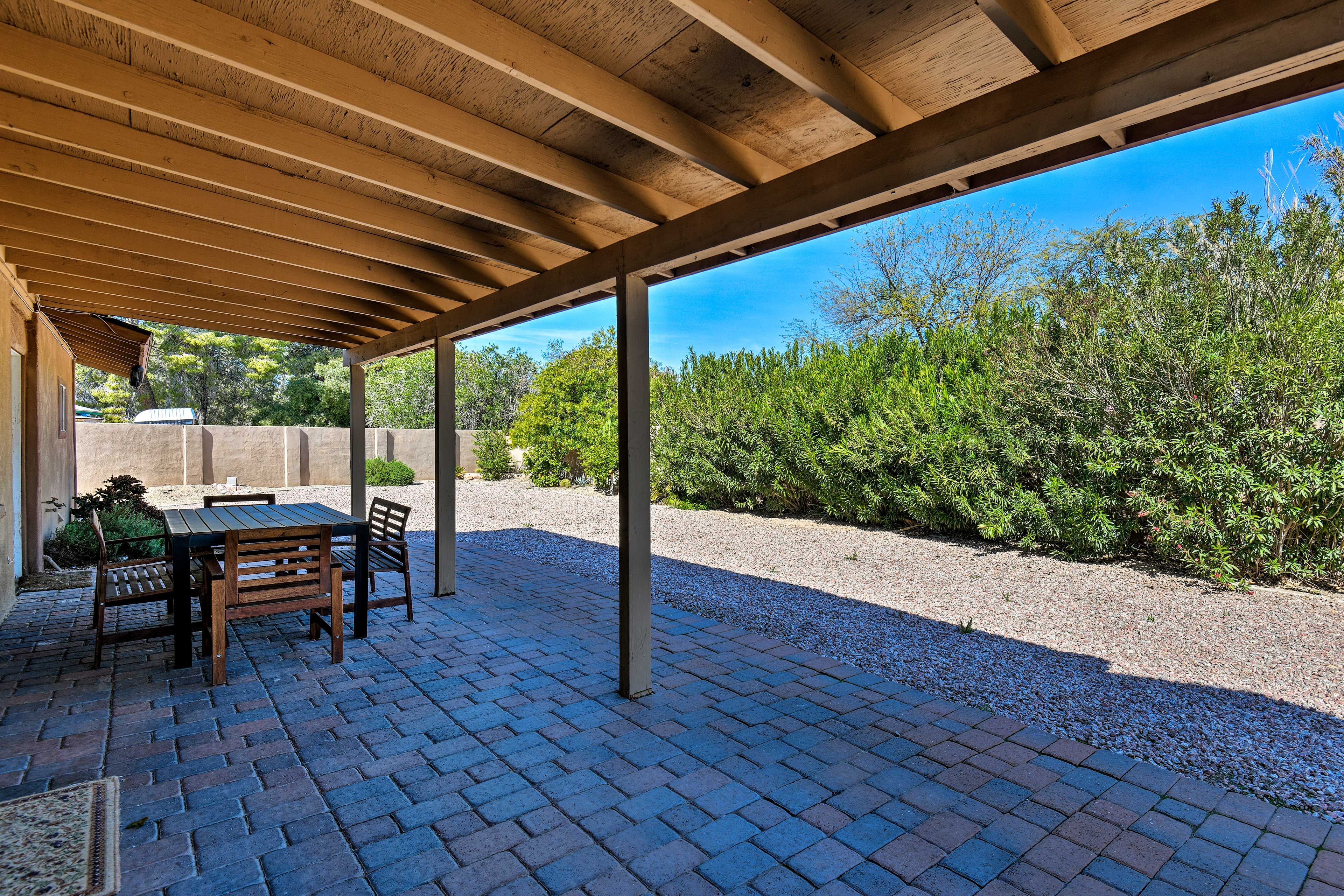 The backyard yard is ideal for summer meals.