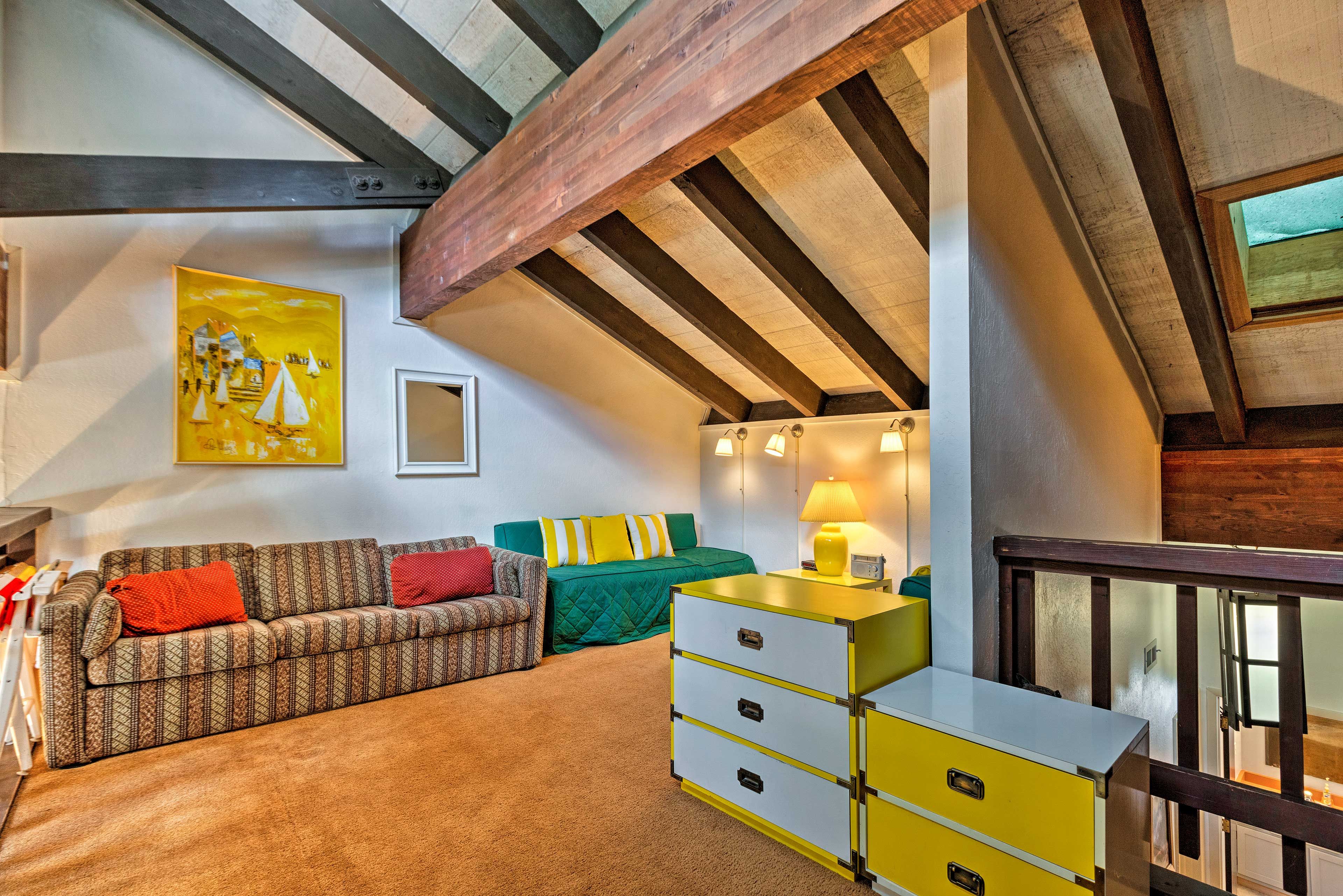 The area features a sleeper sofa.