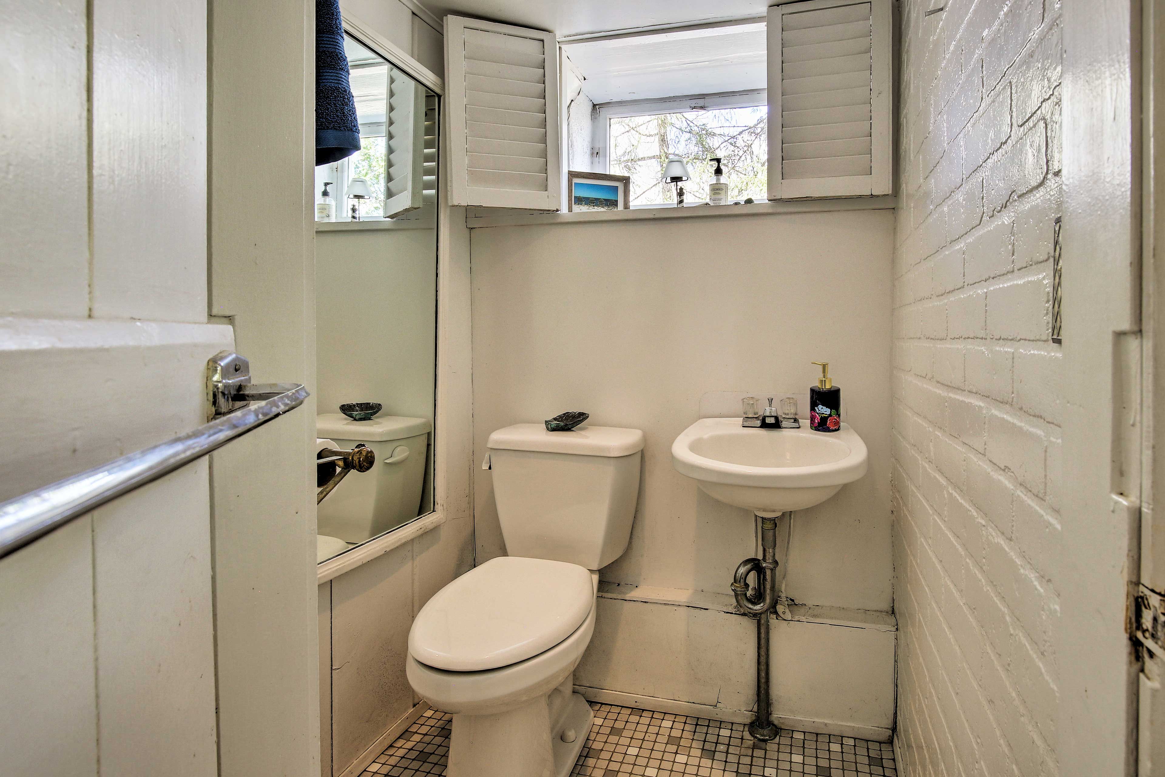 Wash up in this half bathroom.