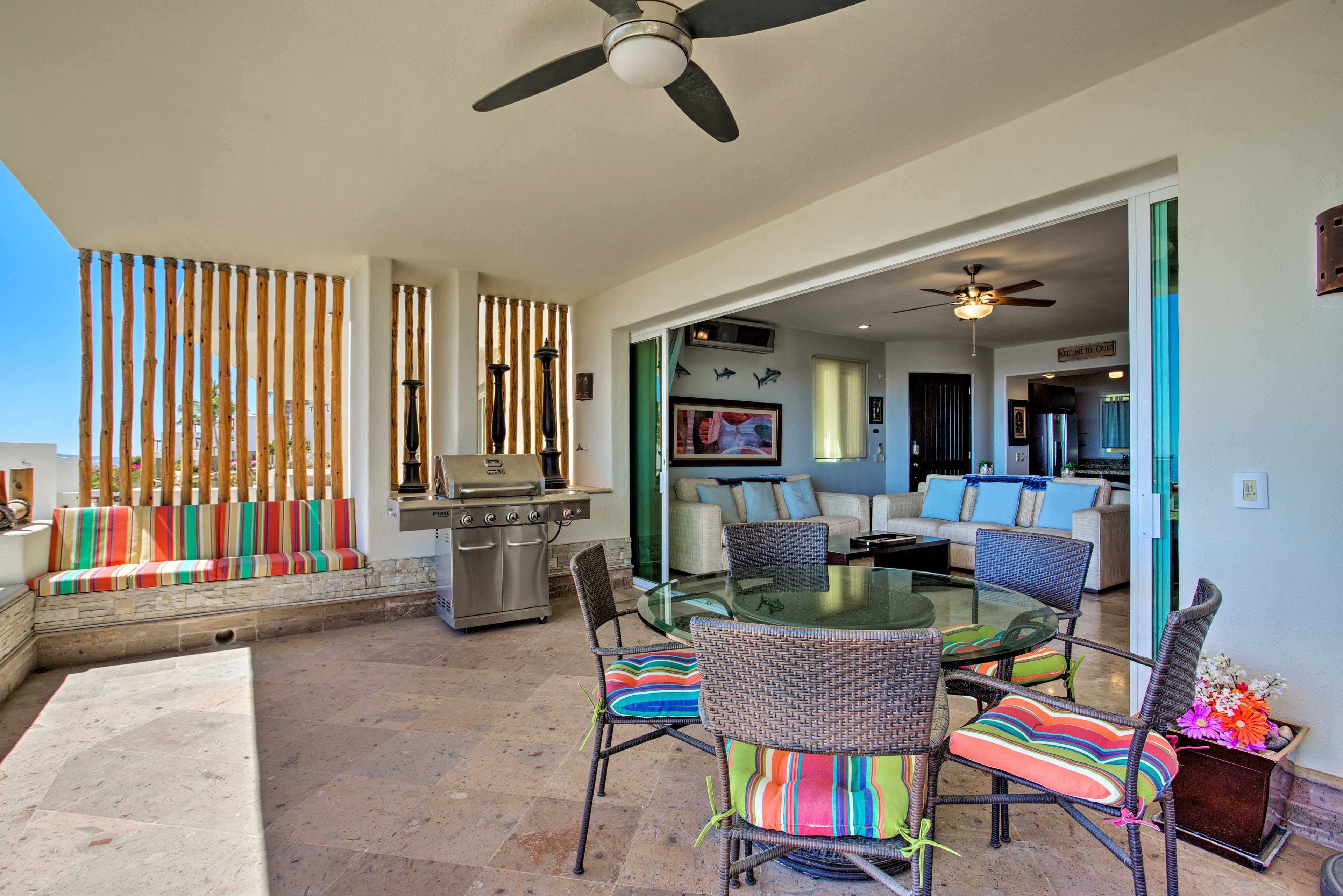 Dine al fresco as a ceiling fan keeps you nice and cool.