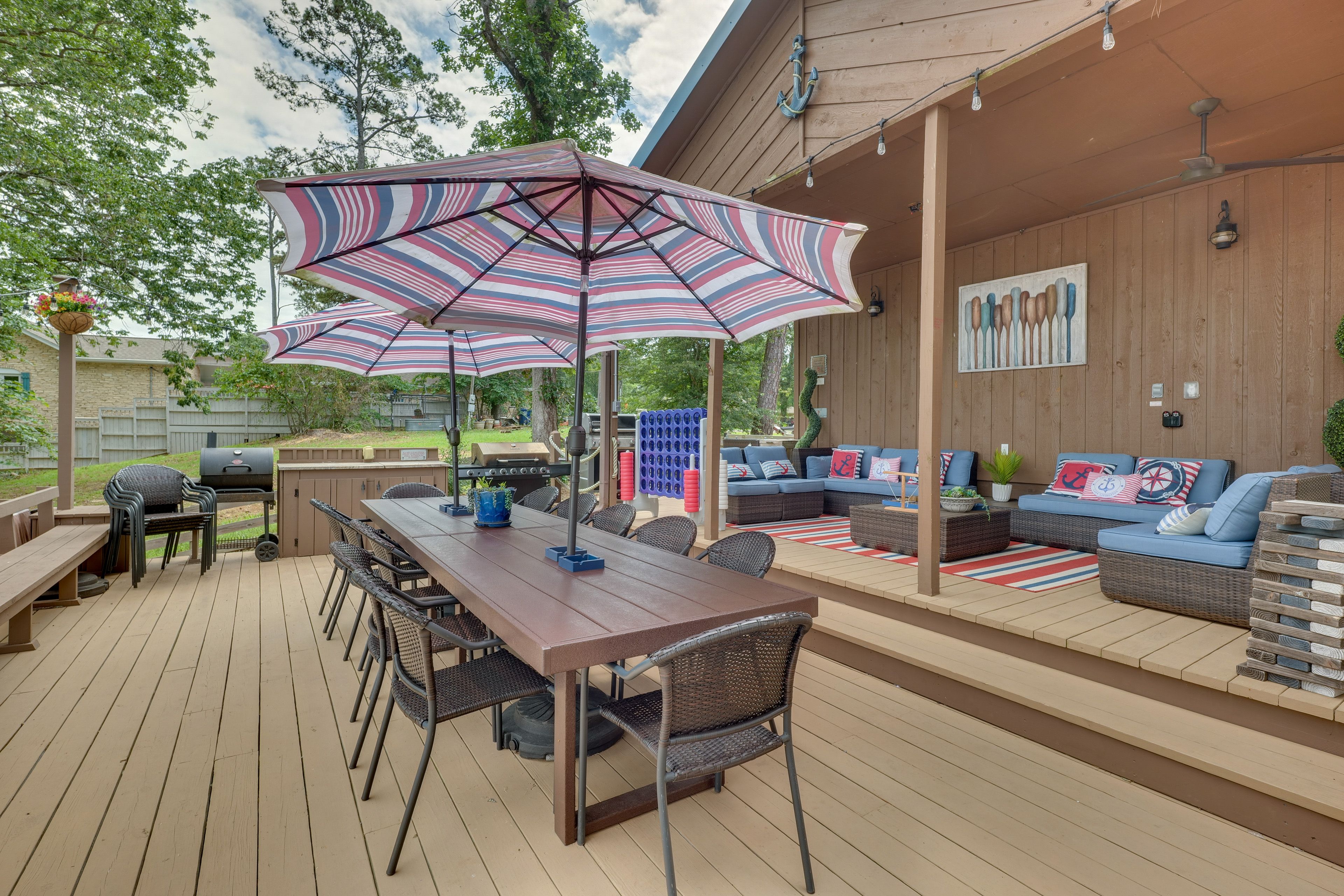 Spacious Covered Seating Area | Fans | Colored Outdoor Lighting