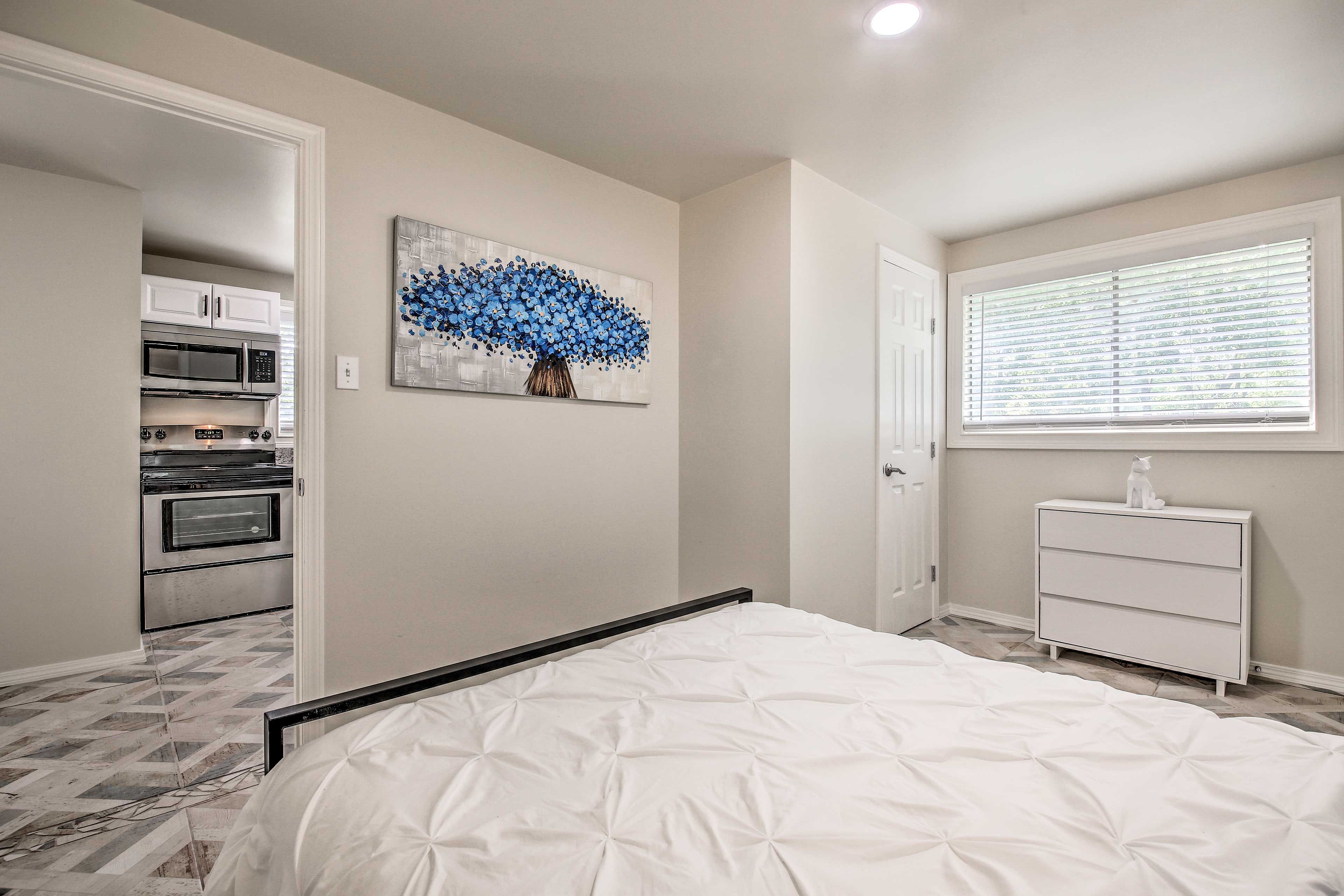 The bedroom is located just off the kitchen.