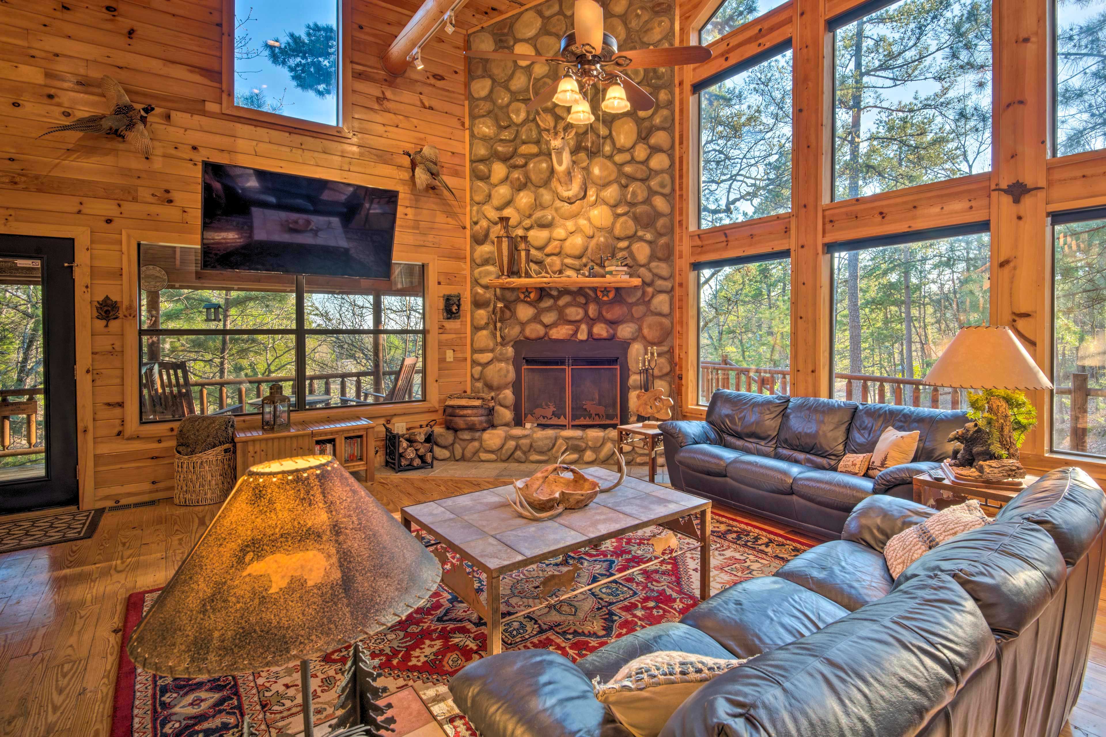 Lounge on the couch and enjoy the warmth of the wood-burning fireplace.