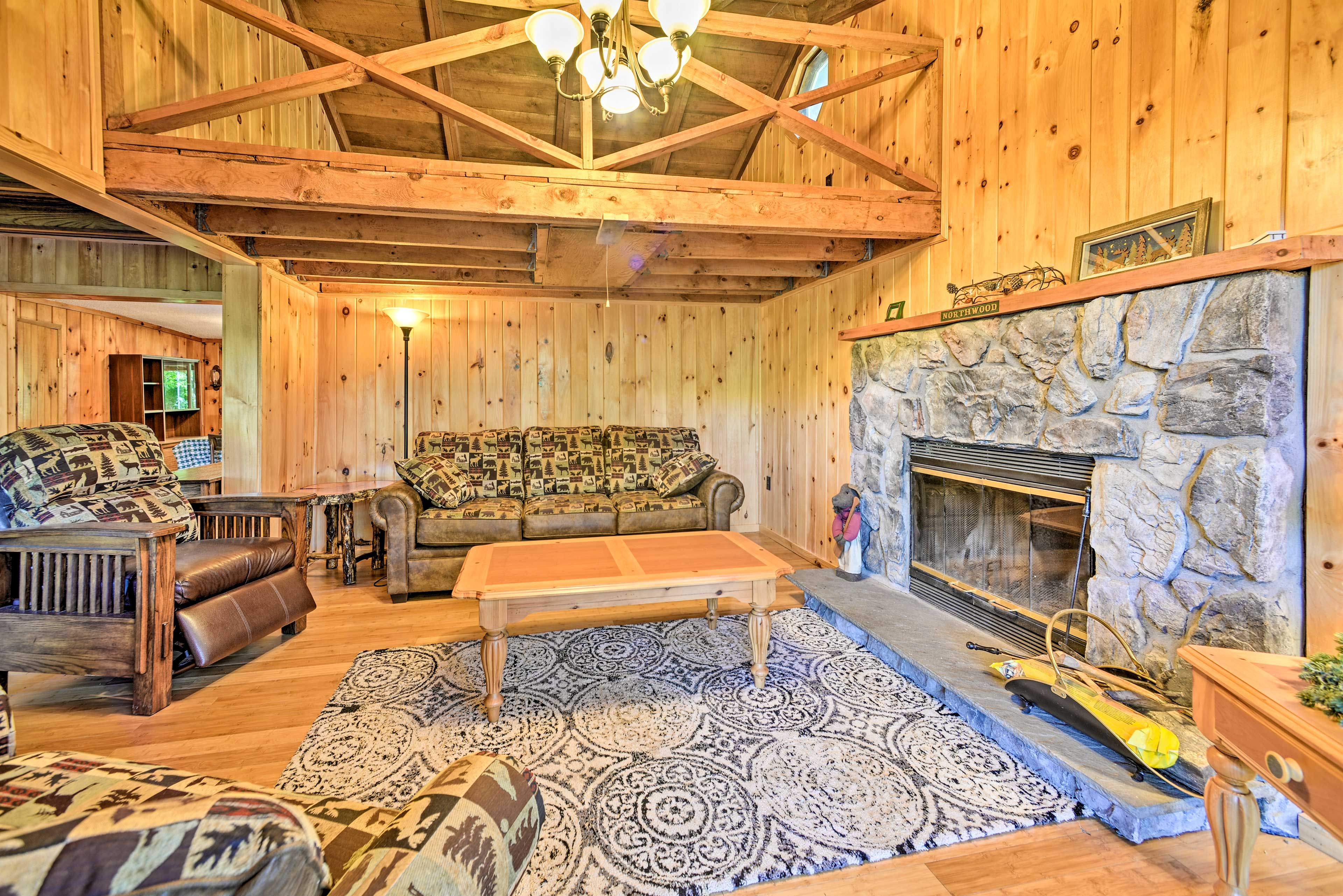 Vaulted ceilings and an open floor plan allow the sunlight to flow throughout.