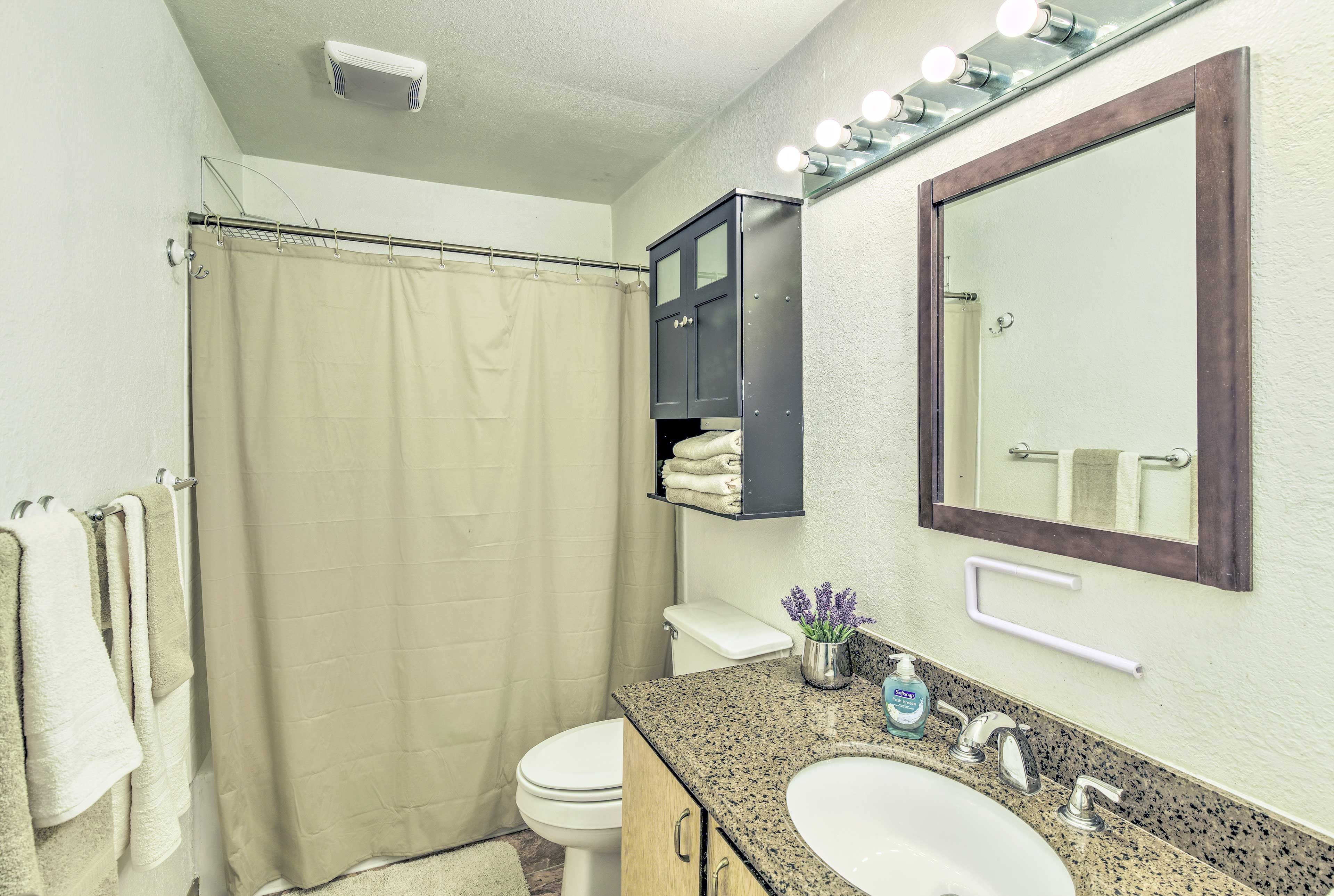 Fresh towels and basic toiletries are provided.