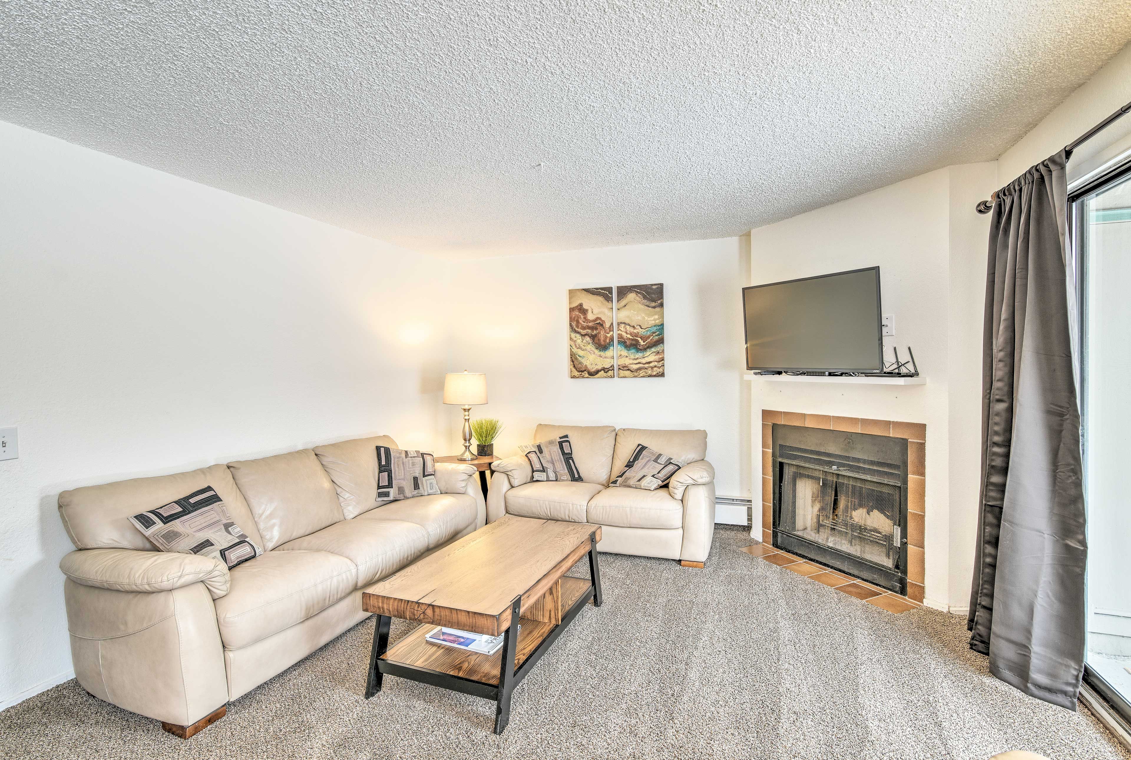 Relax in front of the gas-log fireplace and enjoy your favorite shows.