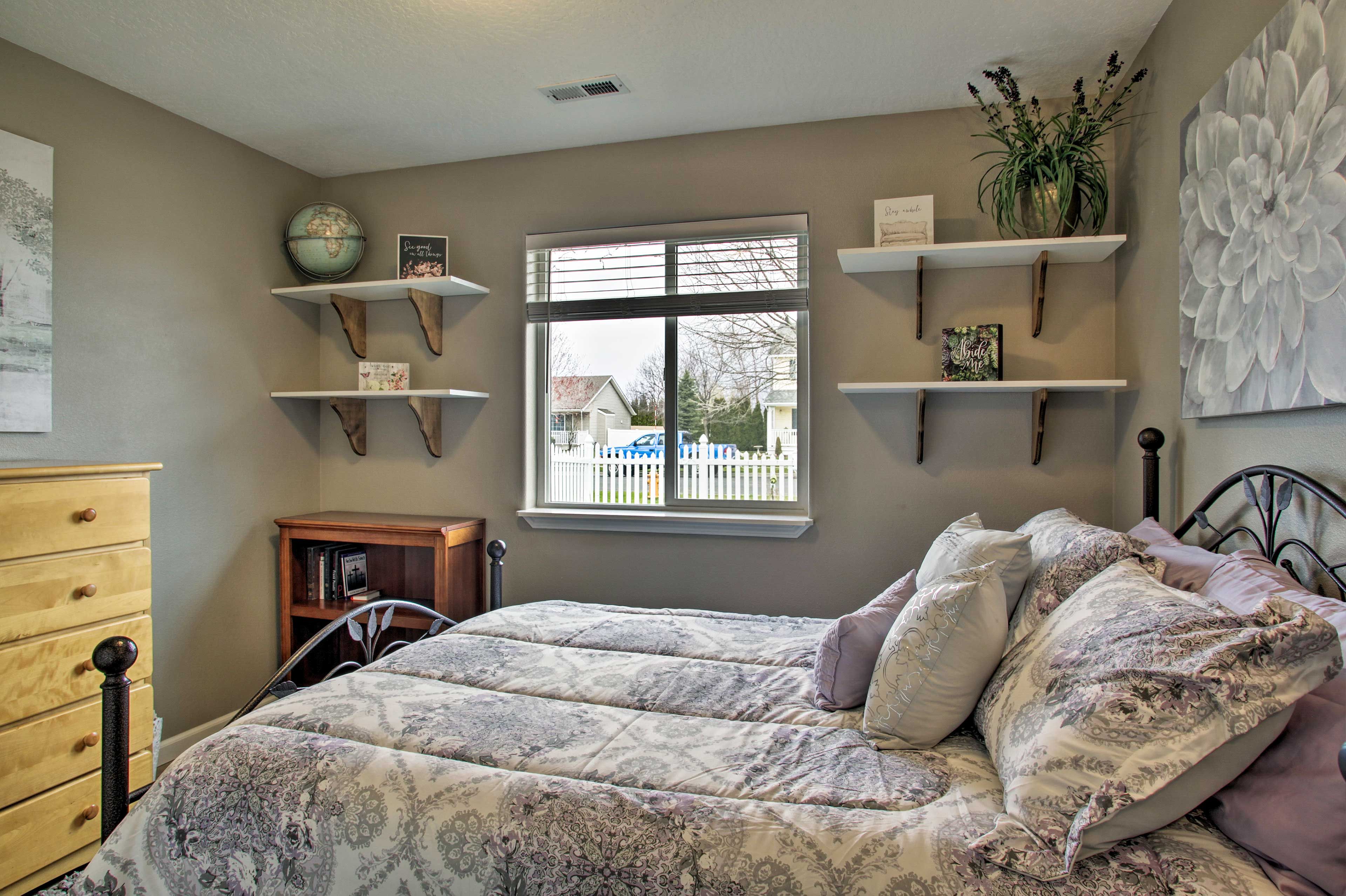 Two guests can share the comfort of this full bed.