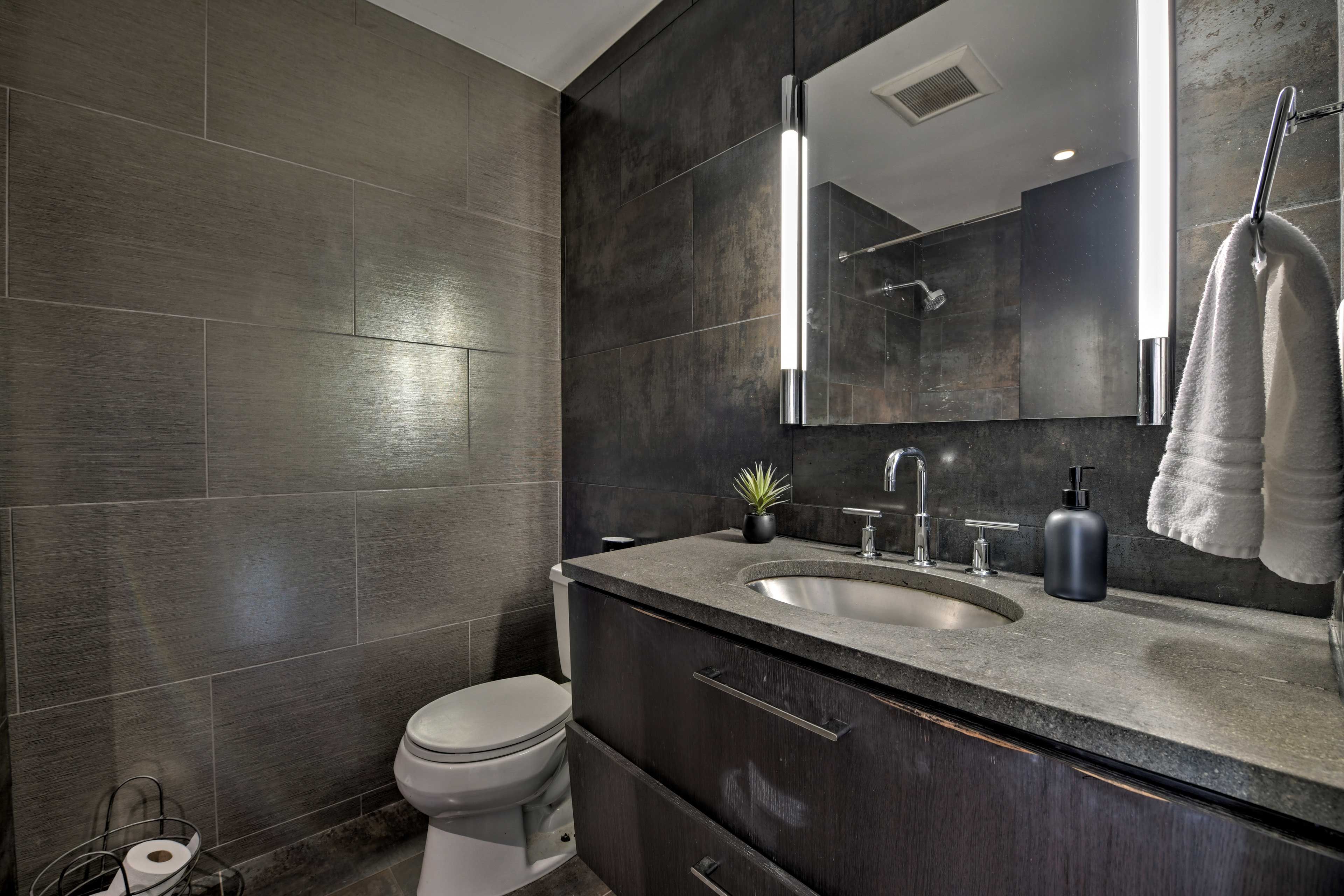 Wash up in this chic bathroom.