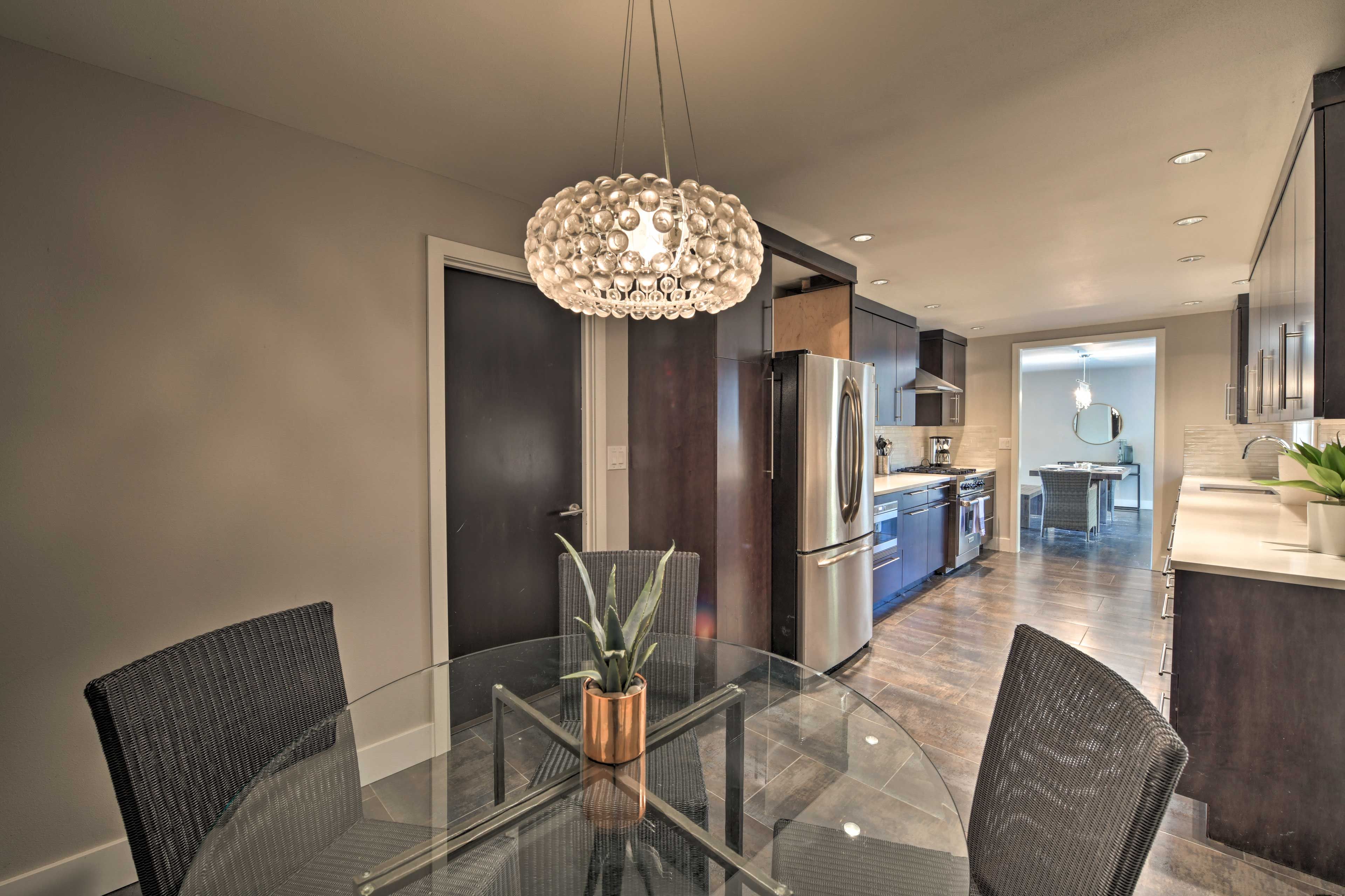 Grab a quick bite to eat at the glass kitchen table.