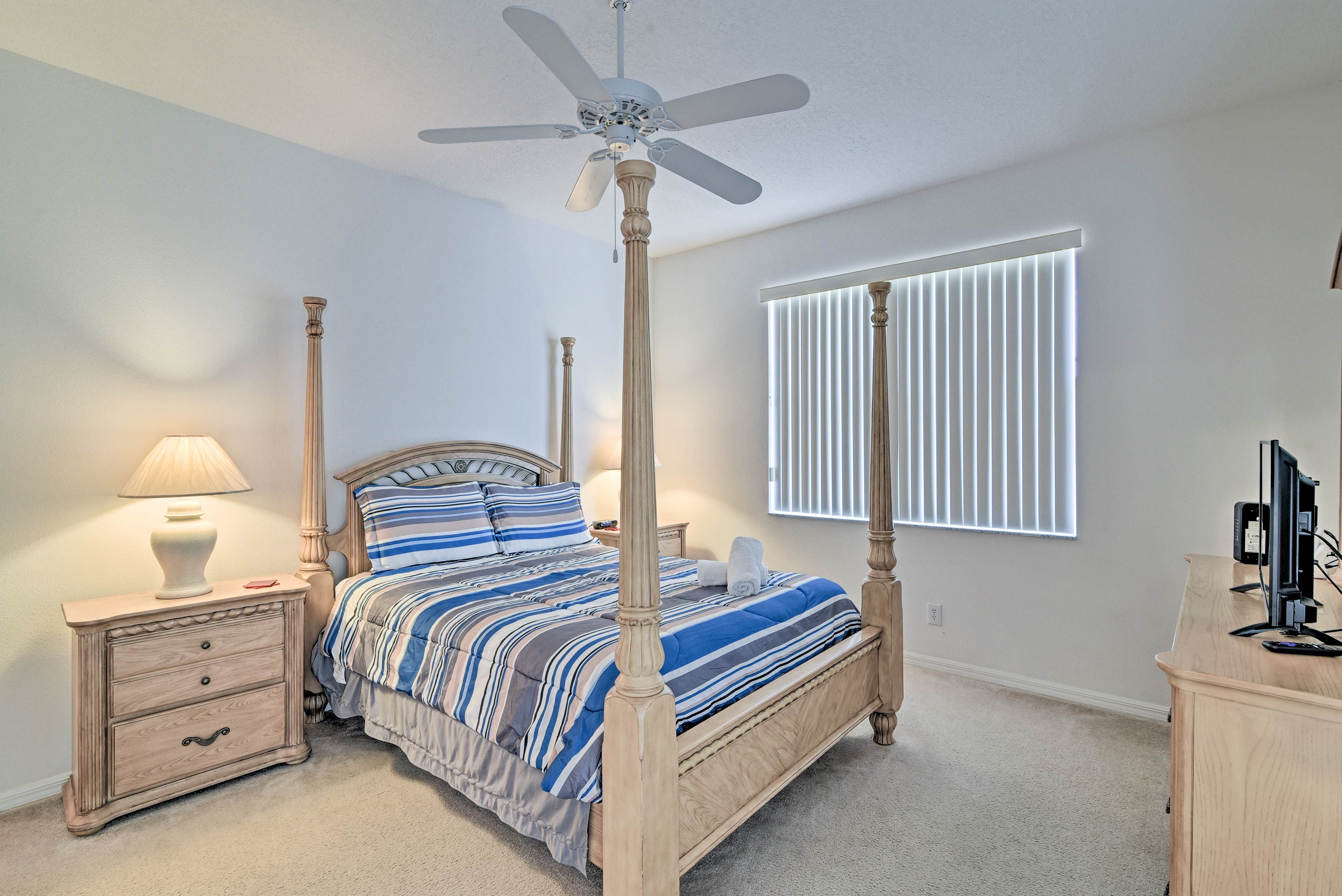 Drift to sleep in this queen bed.