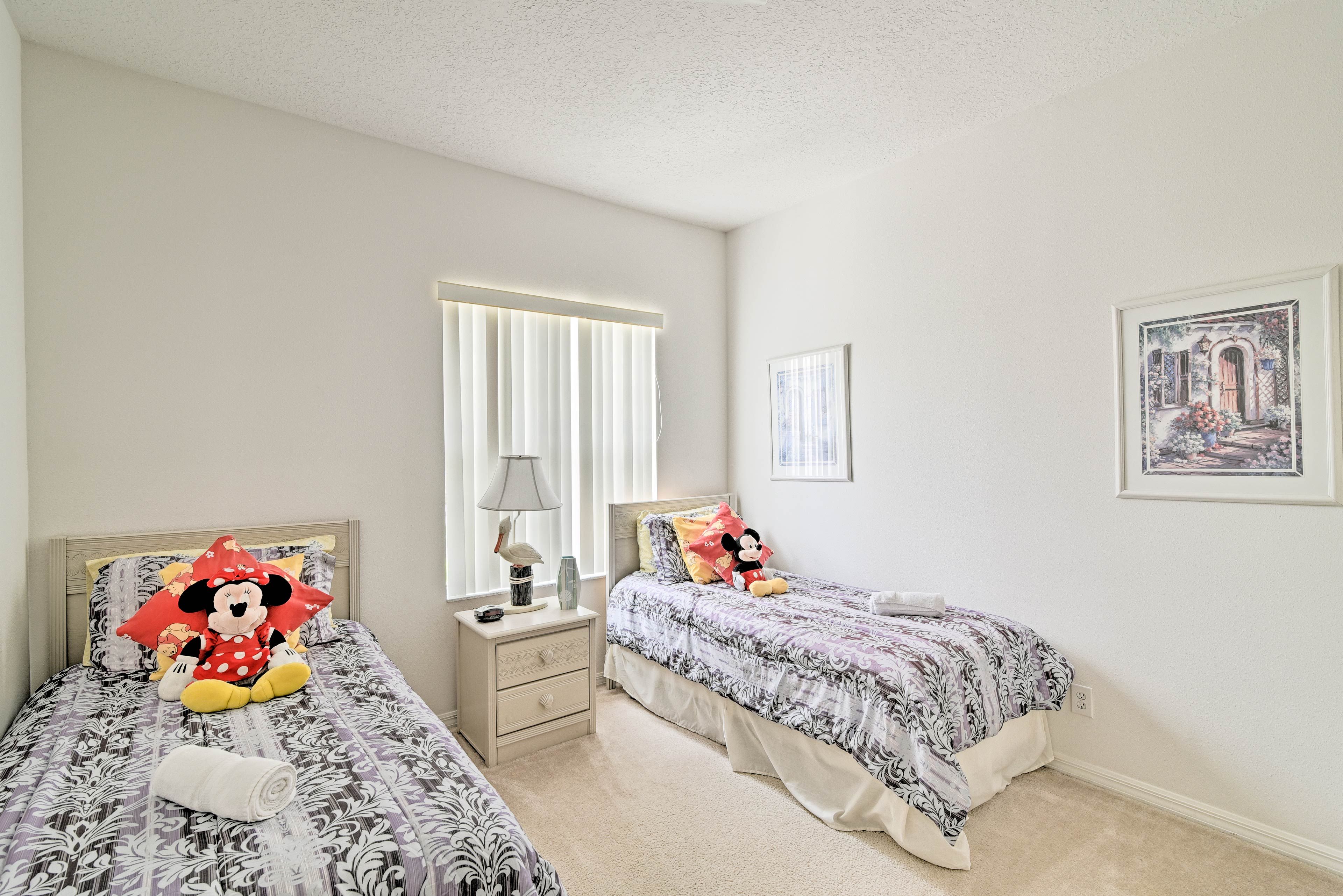 Your little ones will love this room's twin beds.