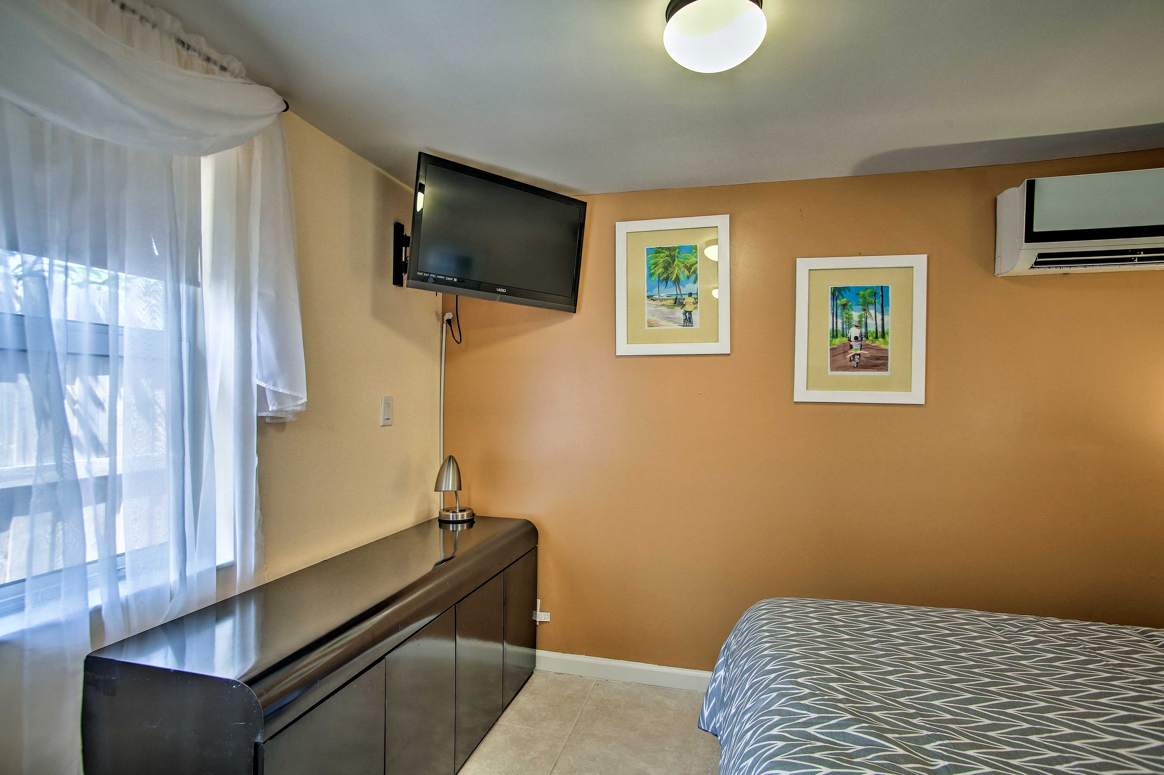 Doze off to sleep after watching shows on the flat-screen Smart TV.