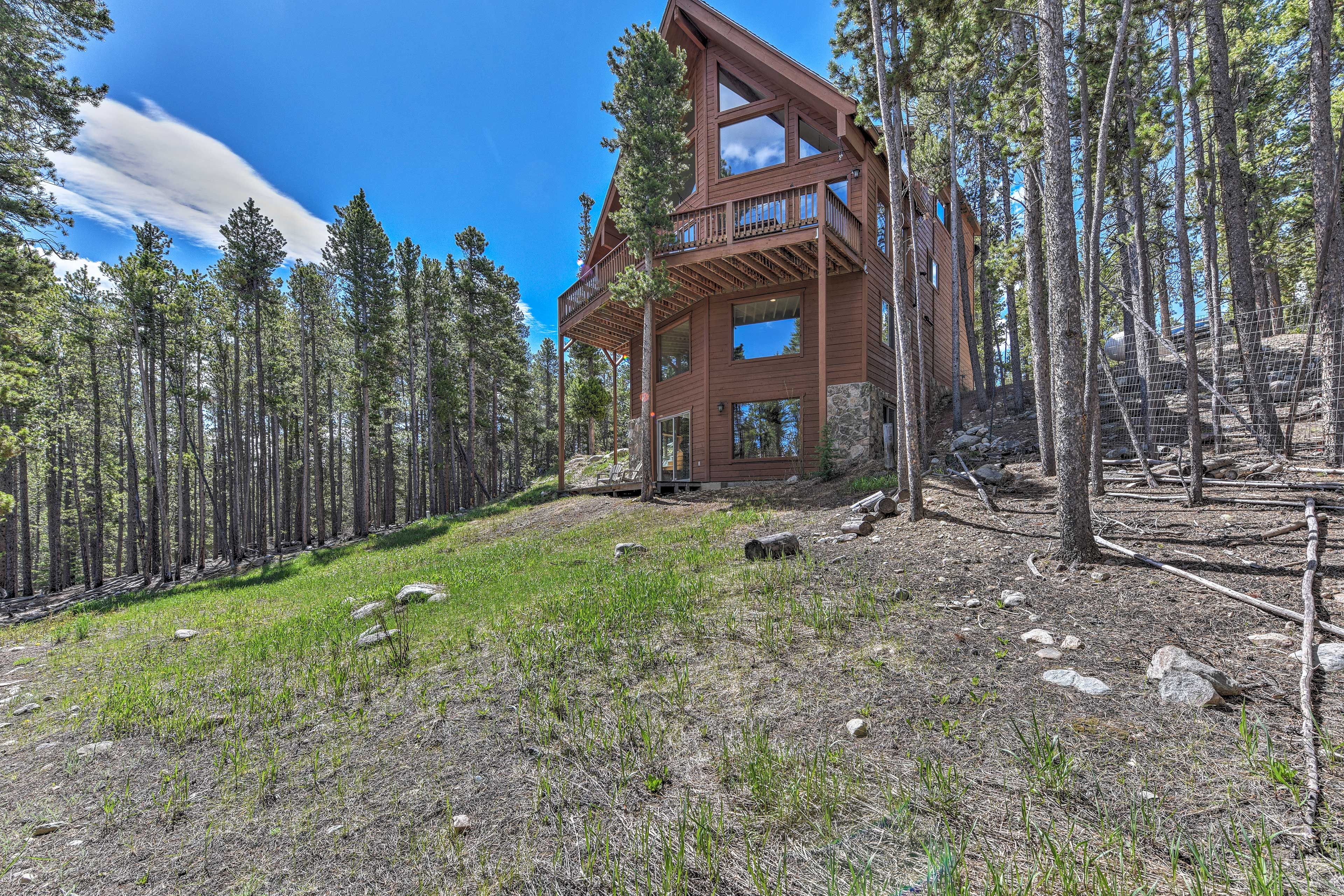 Up to 15 guests can enjoy the beautiful views visible from the home's deck.