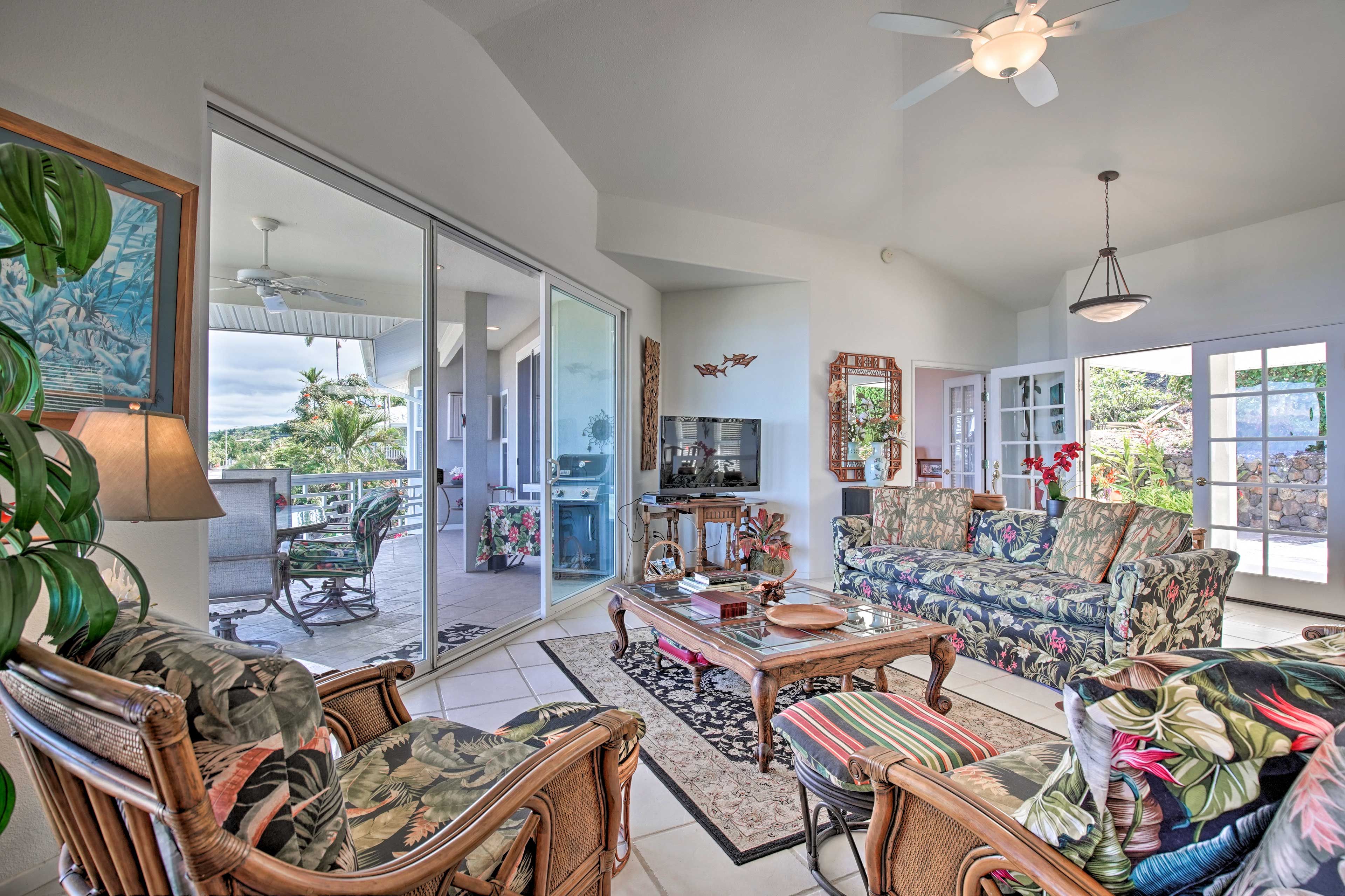 Relax with your favorite shows on the flat-screen TV after a day in the waves.